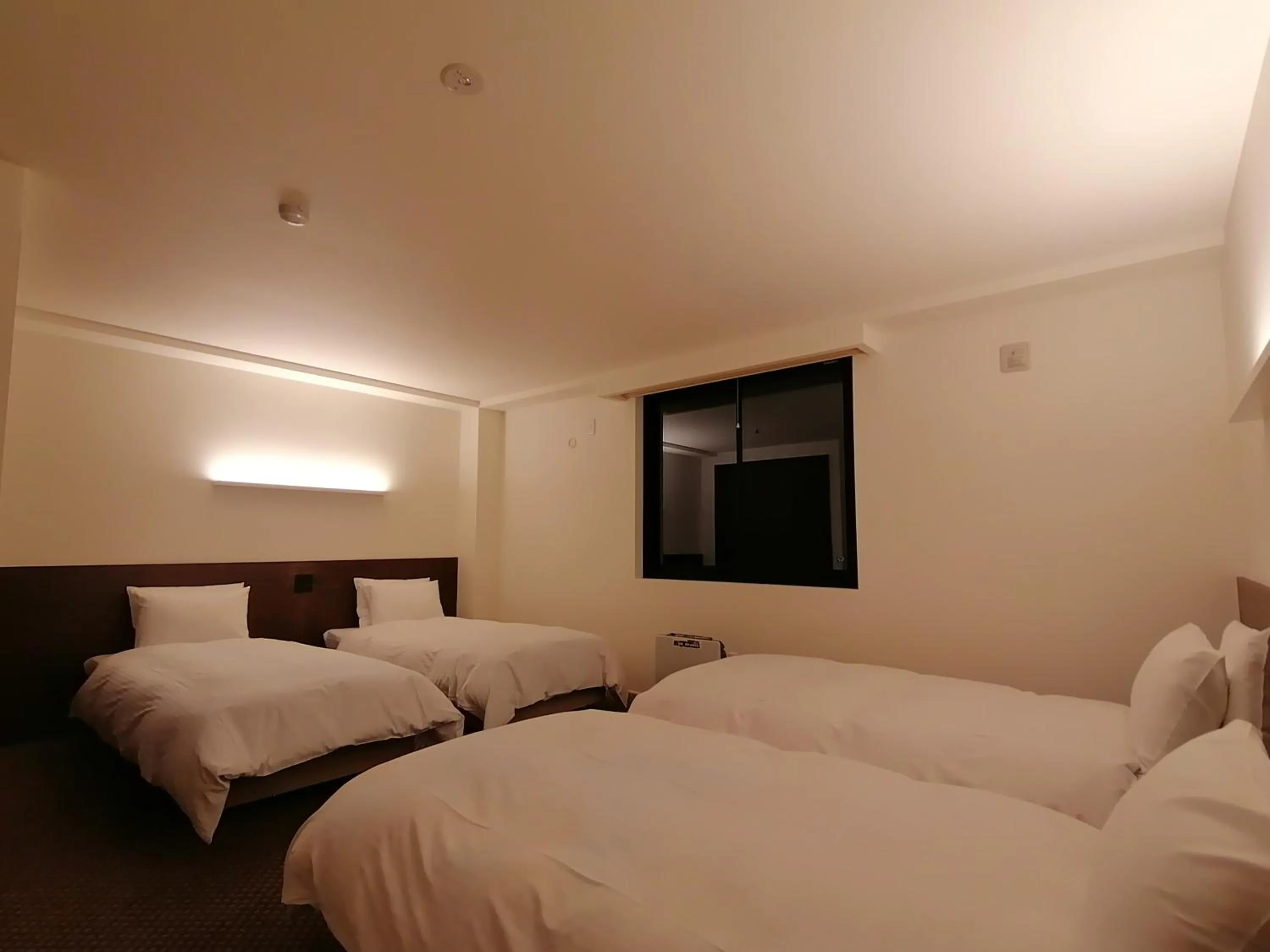 Bed in Fujio Pension Madarao Apartment Hotel & Restaurant