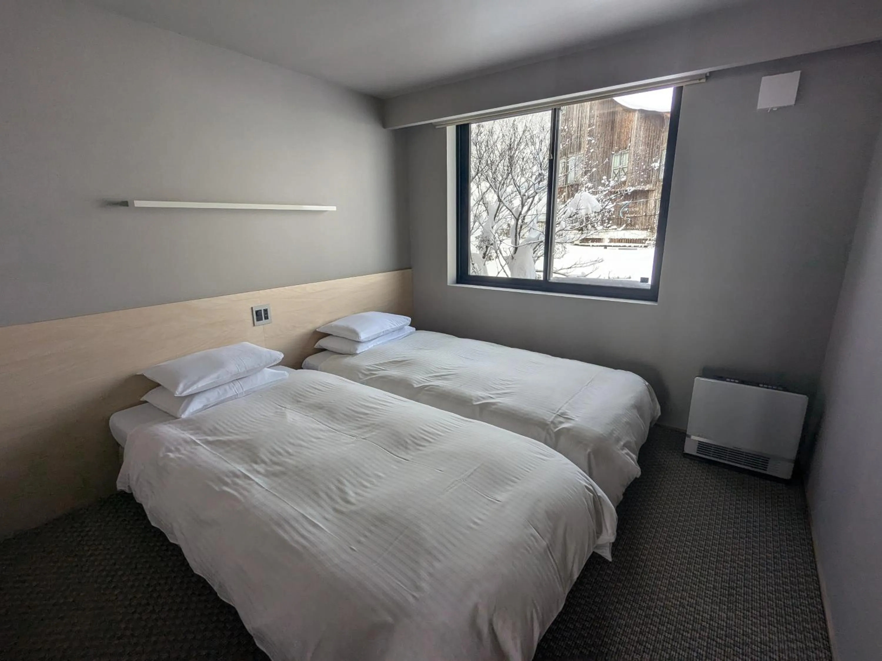 Bed in Fujio Pension Madarao Apartment Hotel & Restaurant