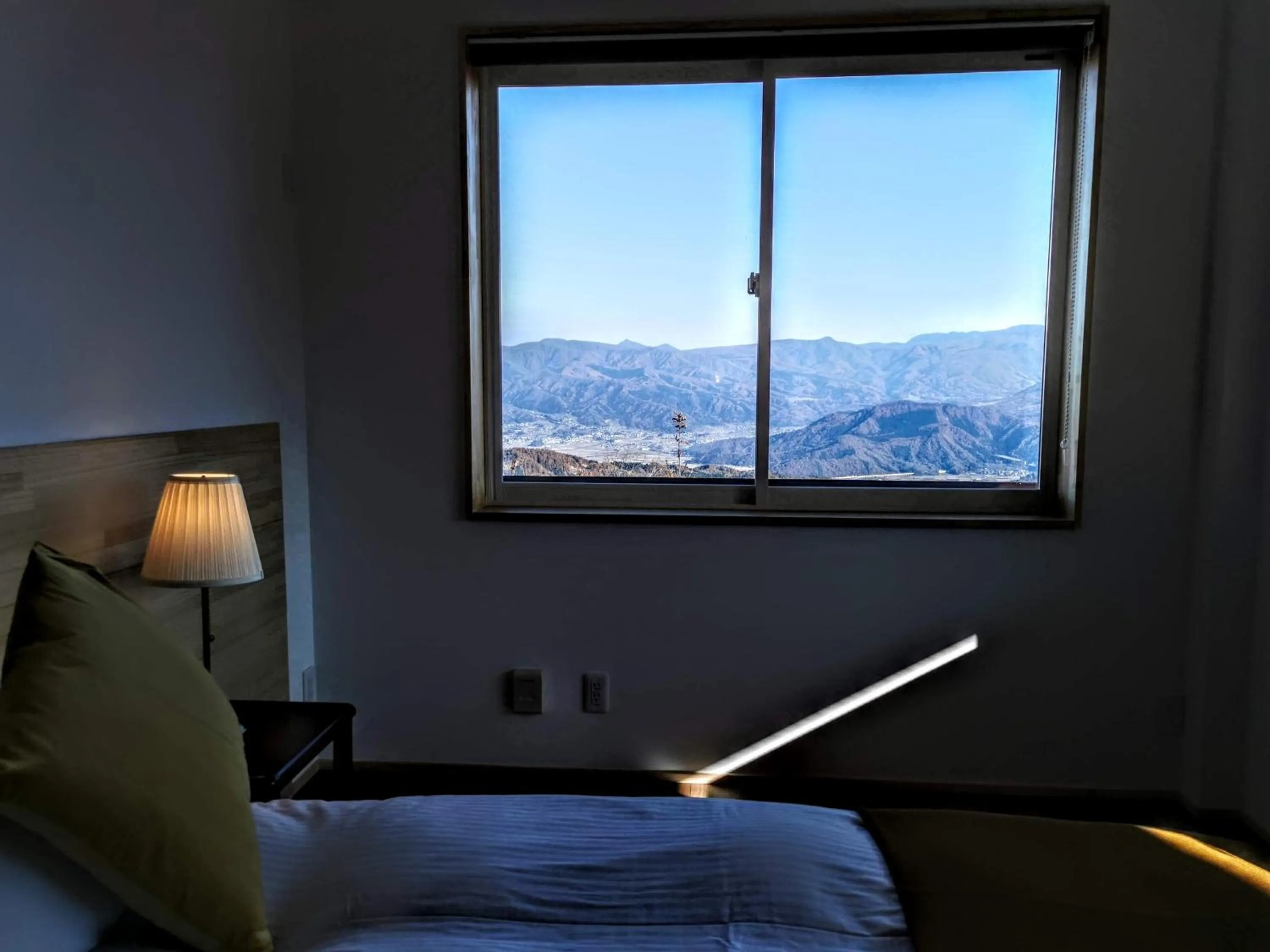View (from property/room), Bed in Fujio Pension Madarao Apartment Hotel & Restaurant