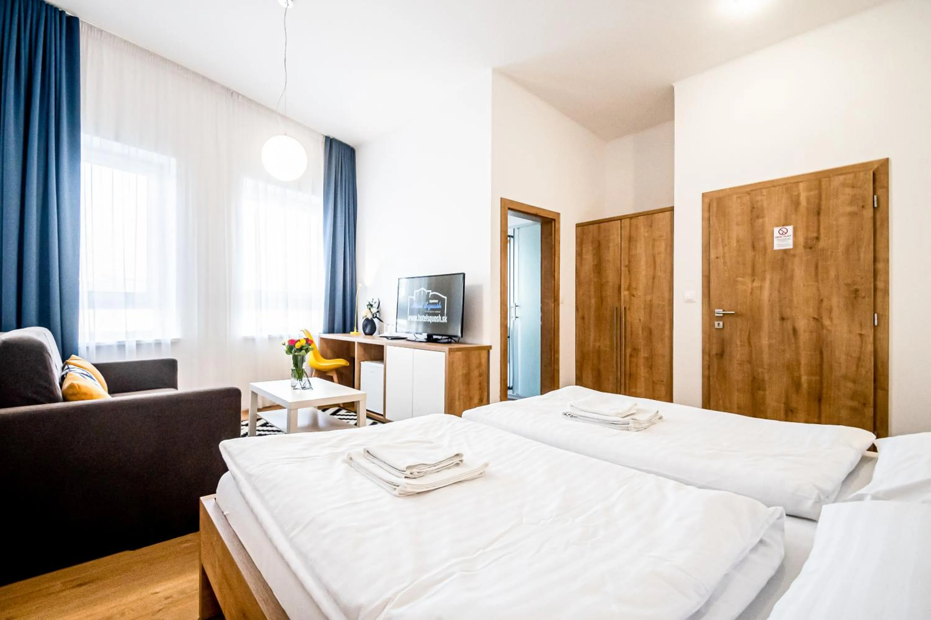 Bed in Hotel Squash Dependance