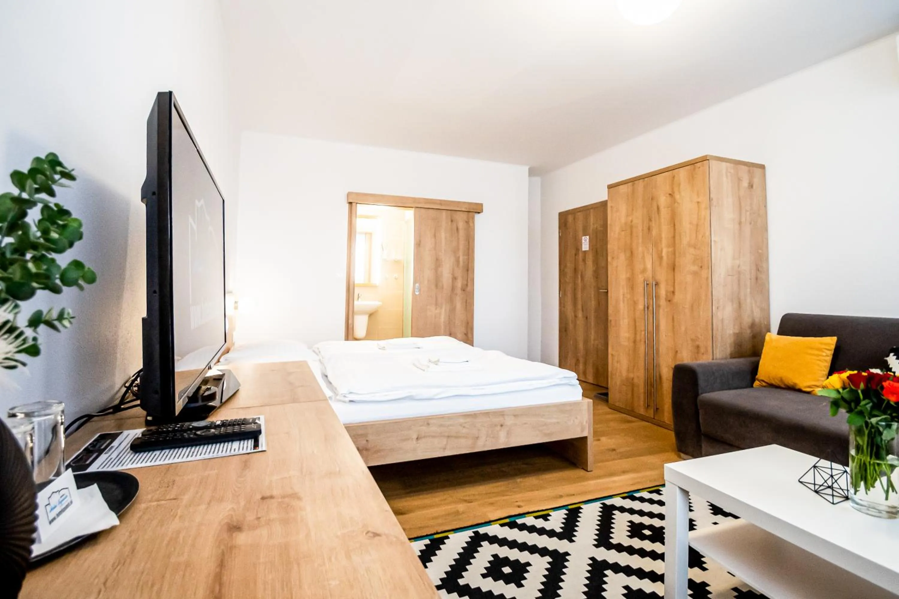 Bed in Hotel Squash Dependance