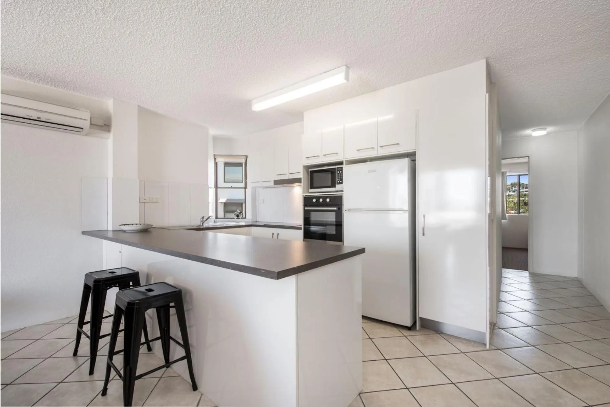 Kitchen or kitchenette in Alexandria Apartments
