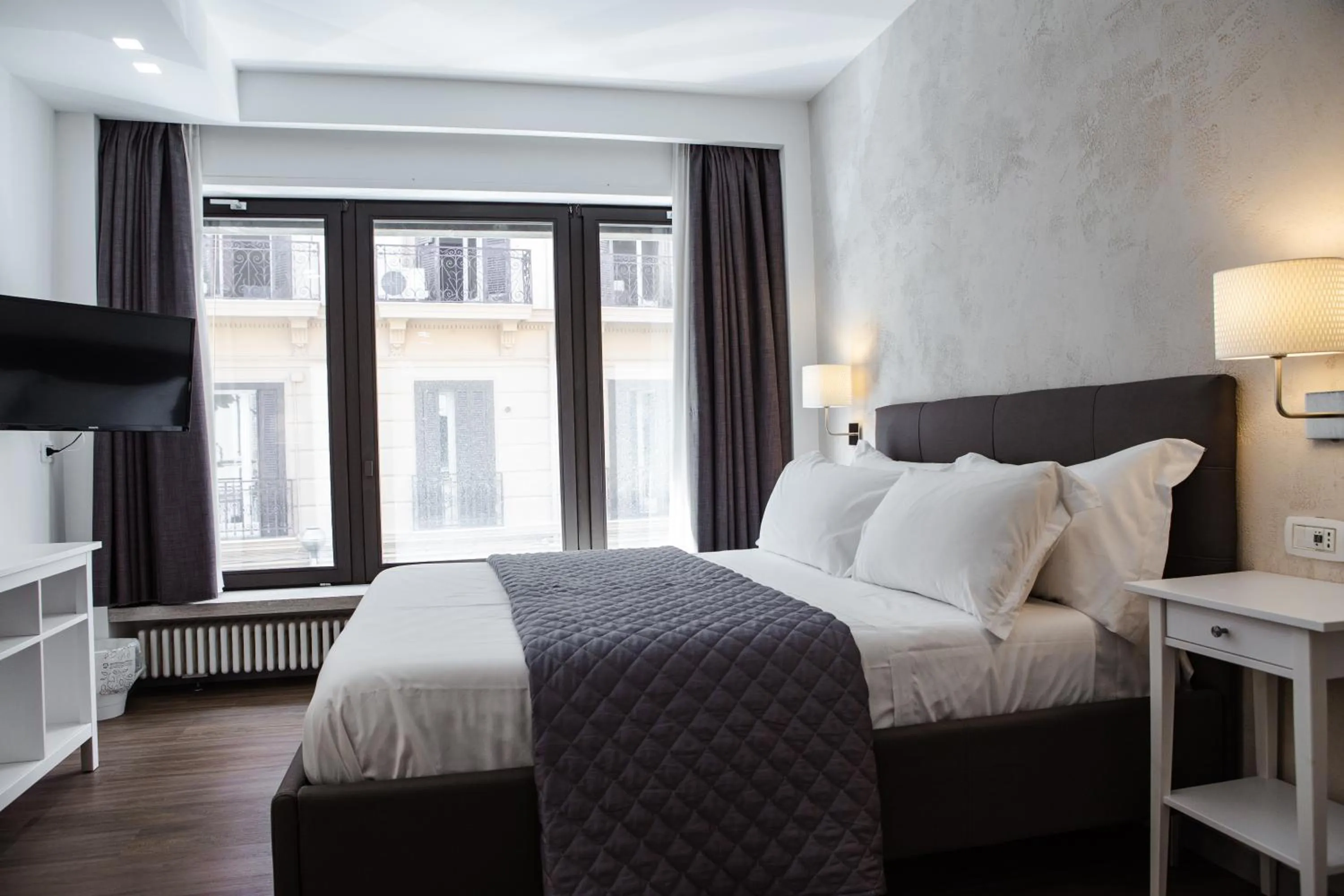 Bed in Prestige Rooms Chiaia Hotel