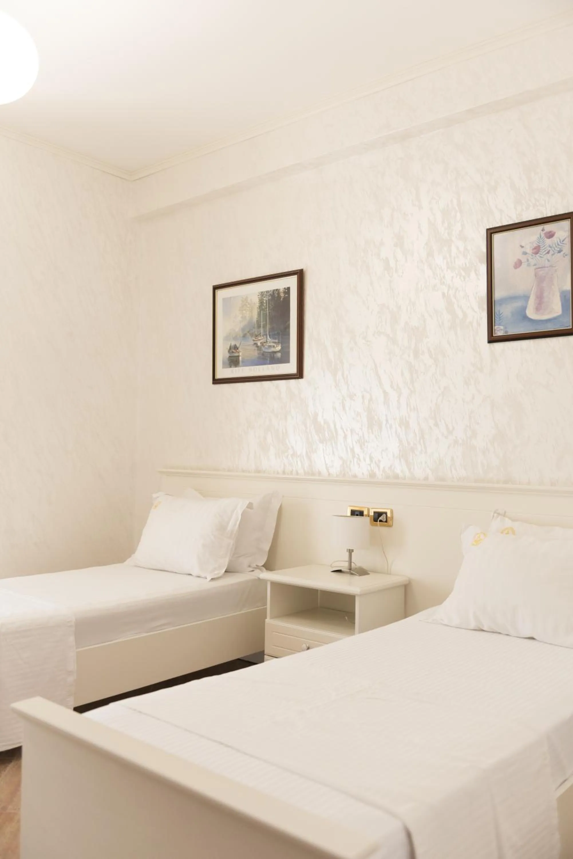 Bed in Iliria Internacional Hotel