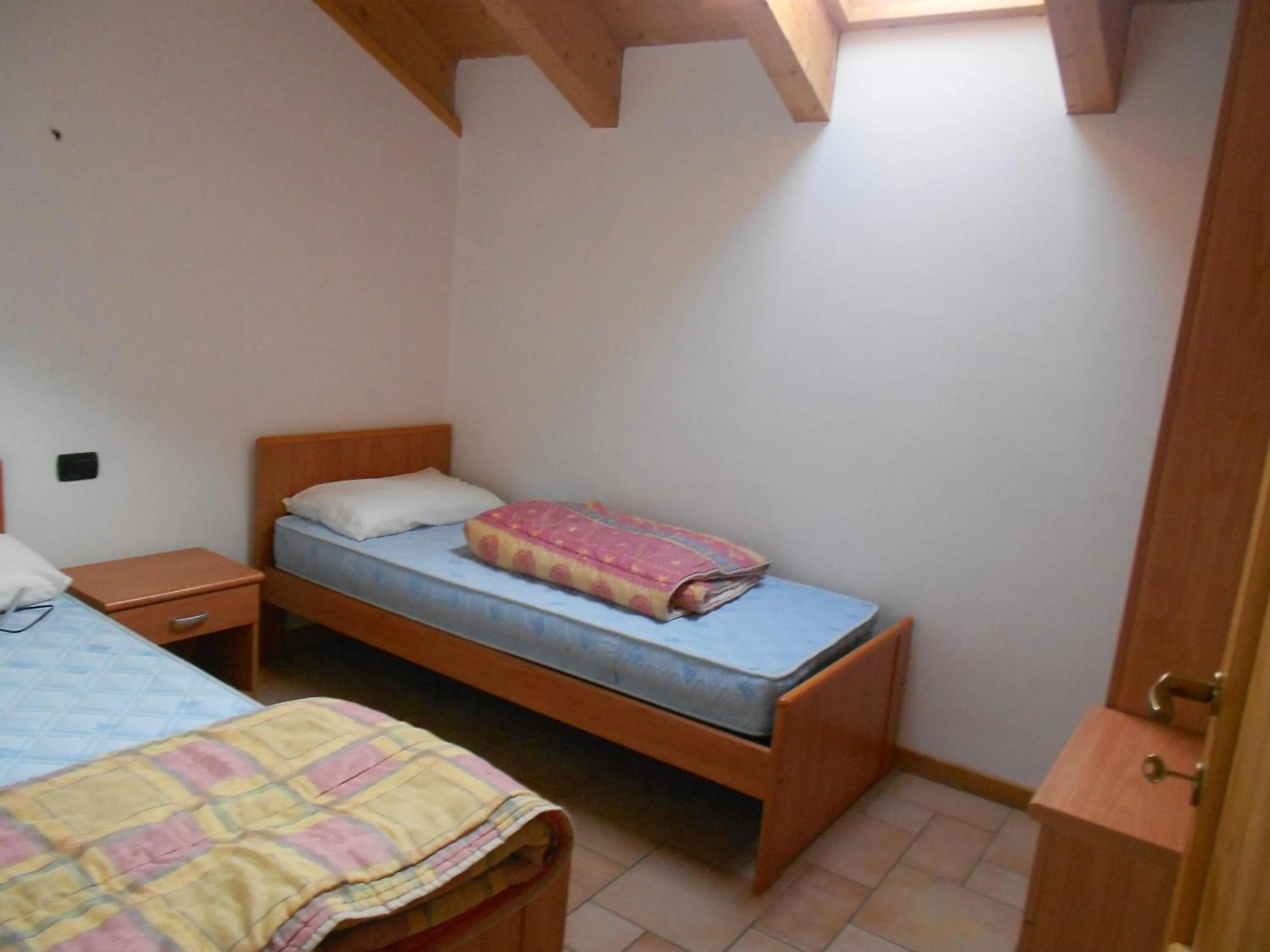 Bed in Residence Le Orchidee