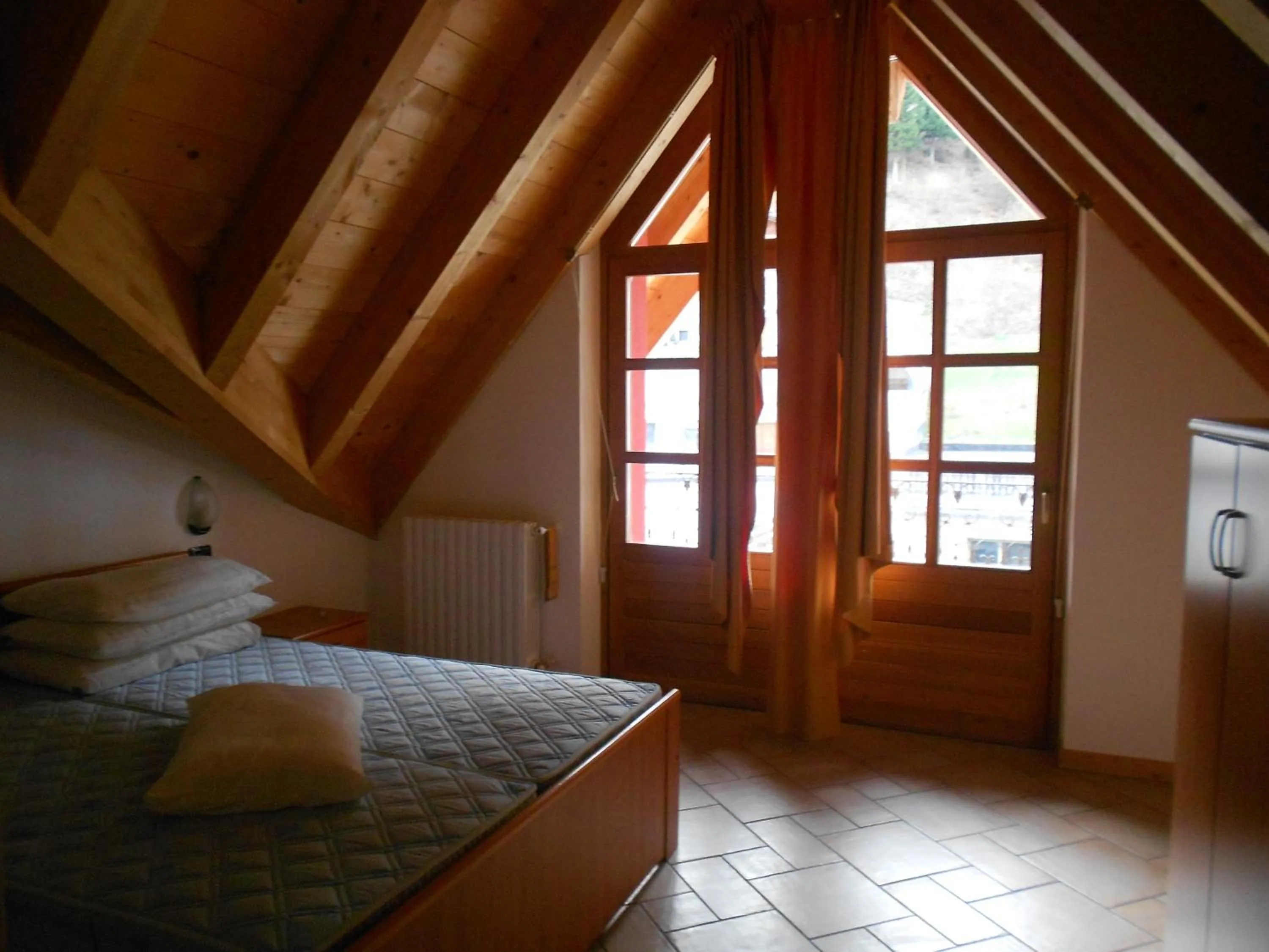 Bed in Residence Le Orchidee