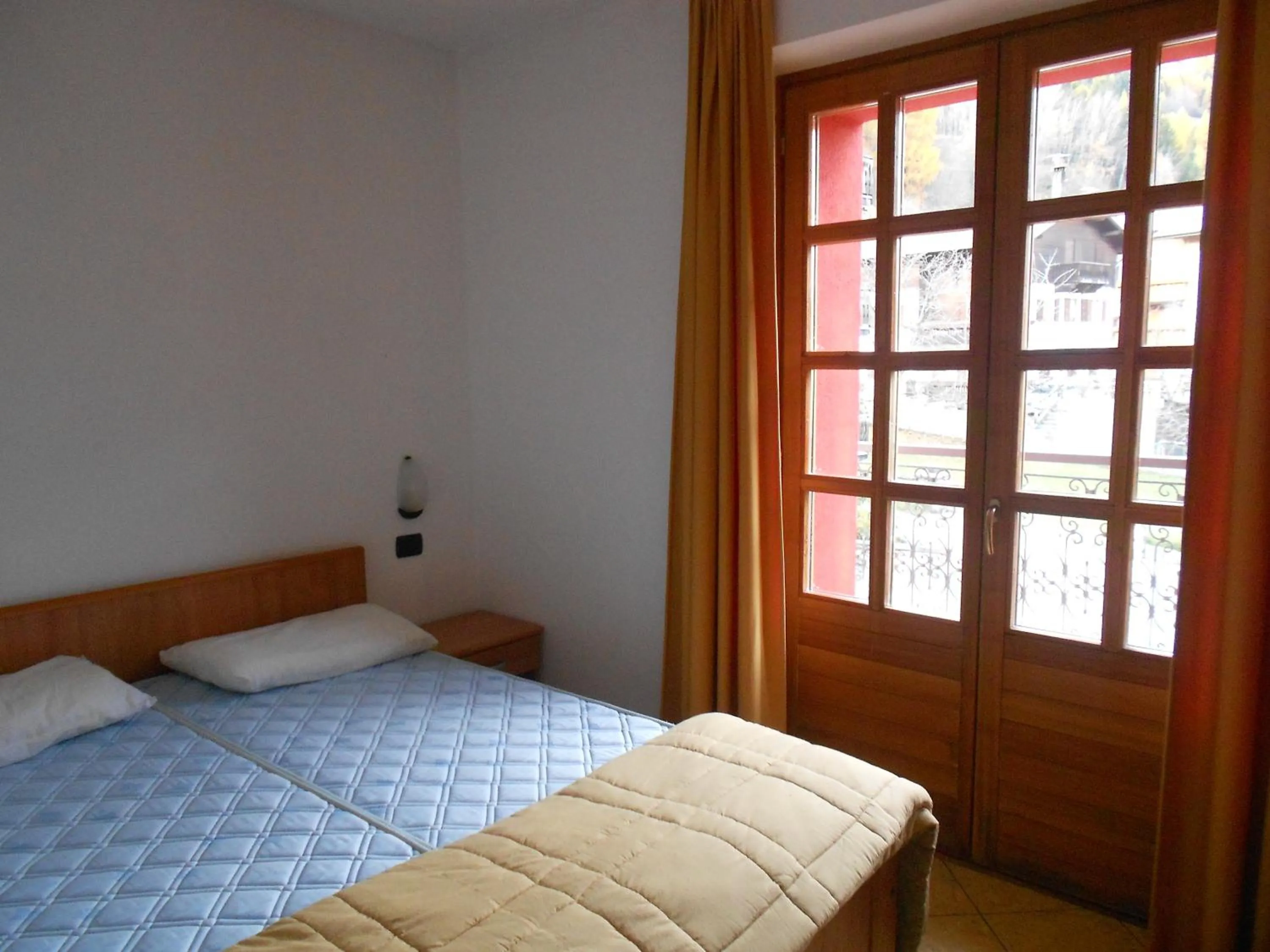 Bed in Residence Le Orchidee