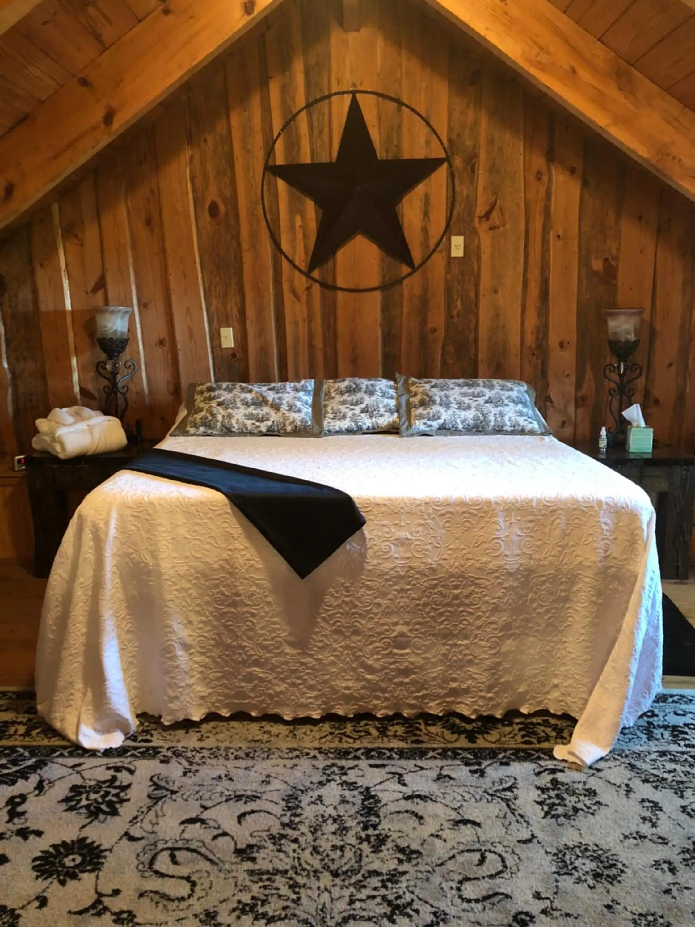 Bed in Cora's Main Log Cabin