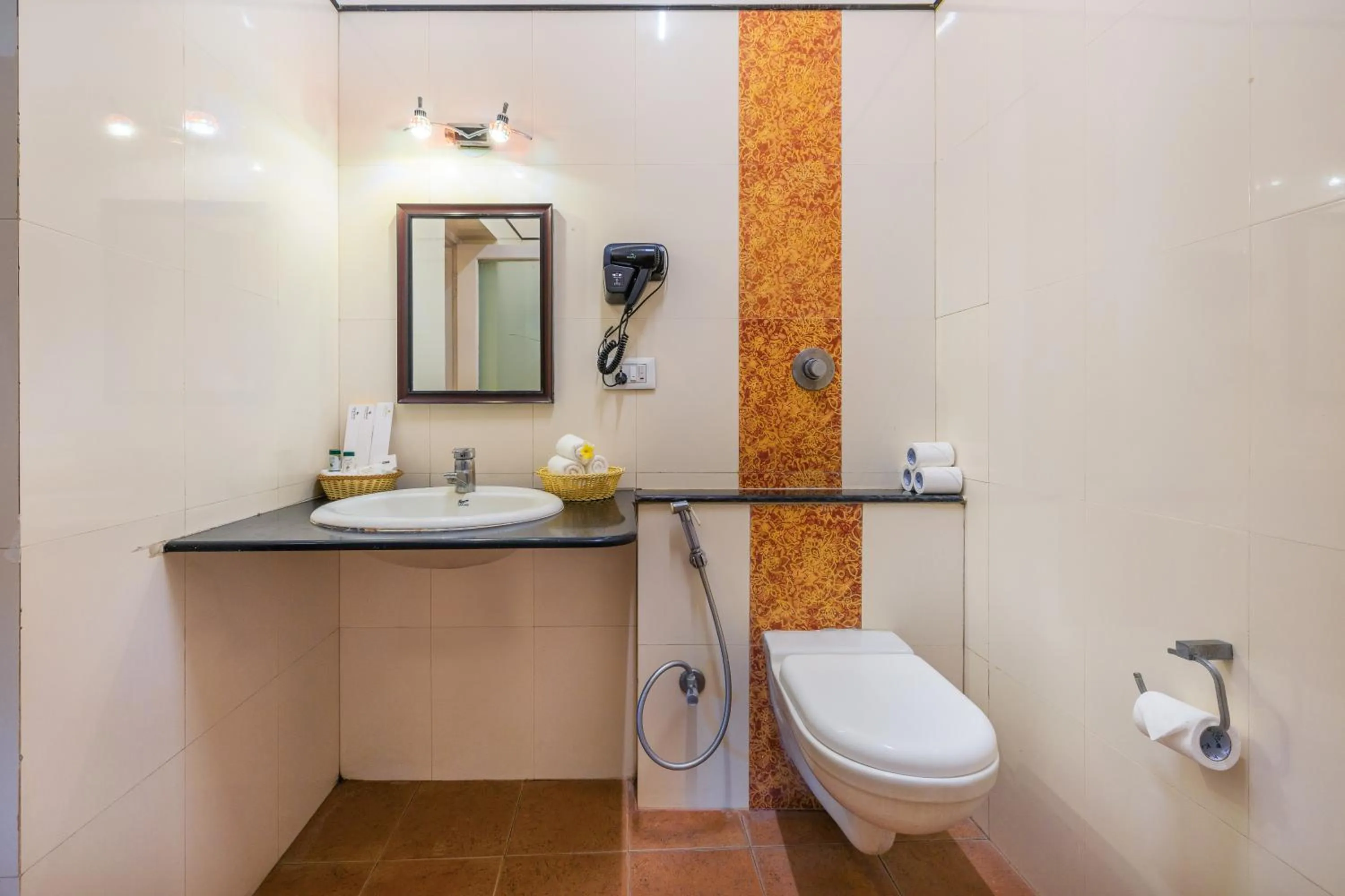 Bathroom in Vijayshree Resort, Hampi