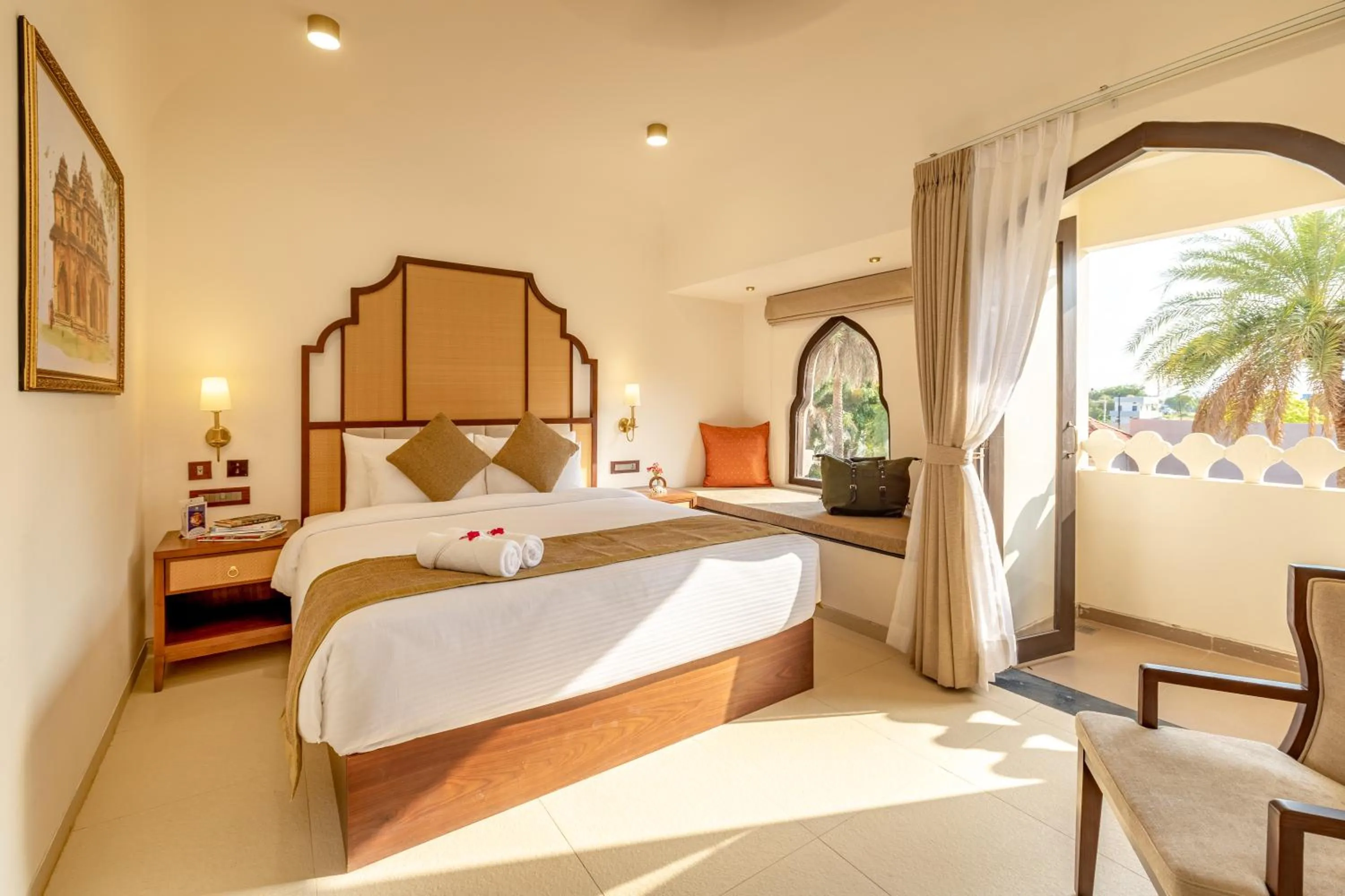 Bed in Vijayshree Resort, Hampi