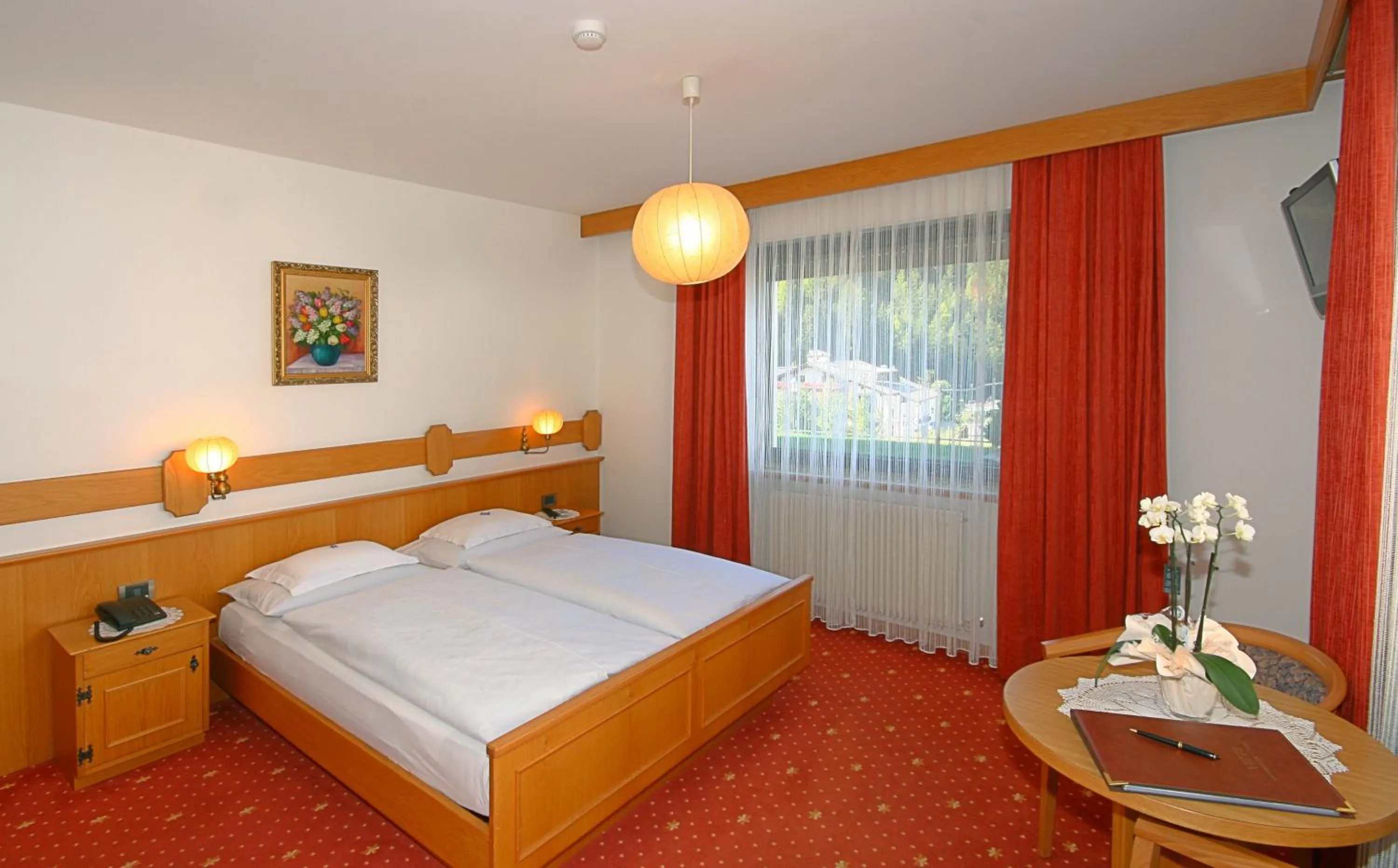 Bed in Garni Hotel Rezia