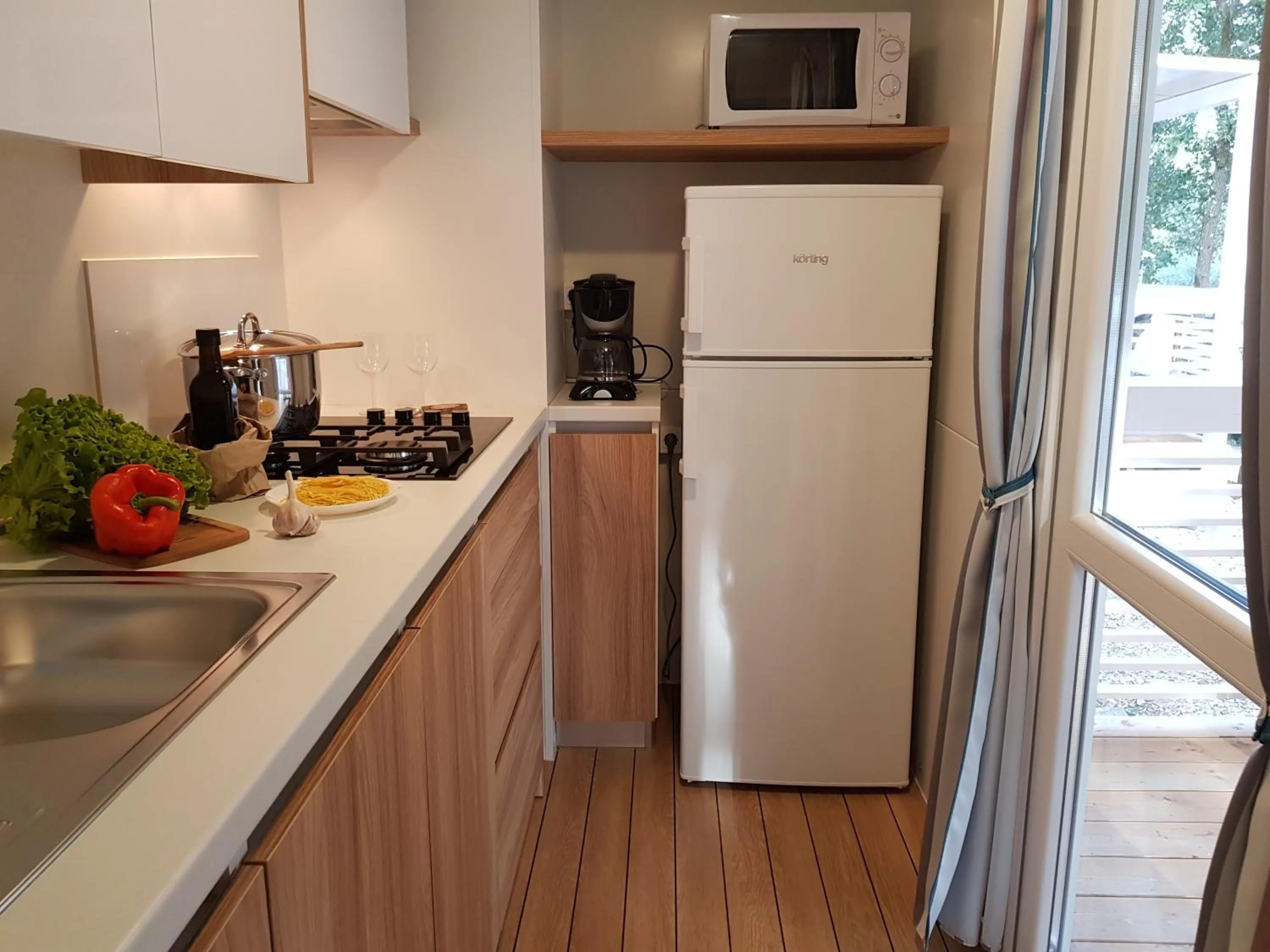 Kitchen or kitchenette in Mobile Homes Banko in Bijela Uvala and Zelena laguna