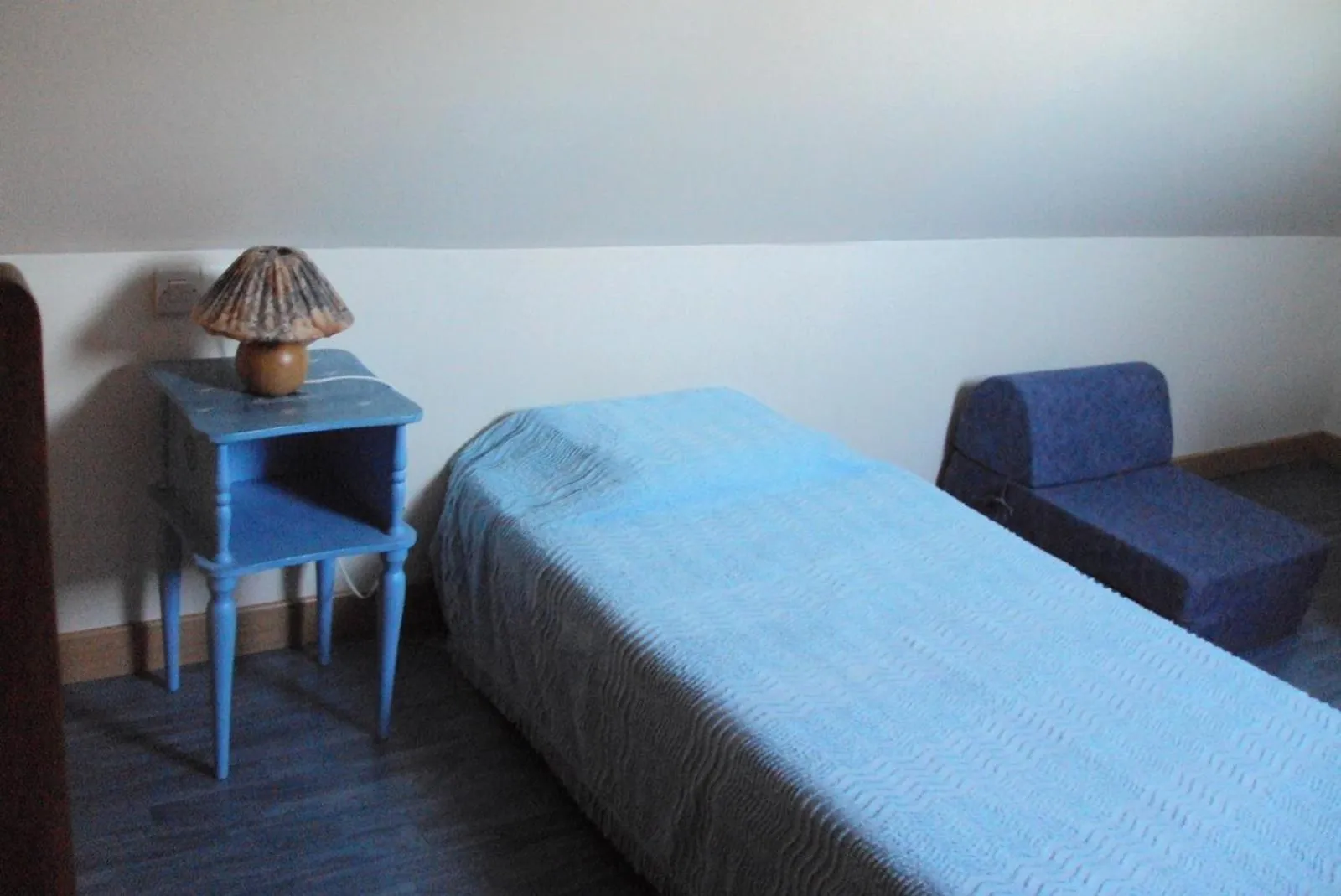 Bed in Gîtes du Ménez-Hom