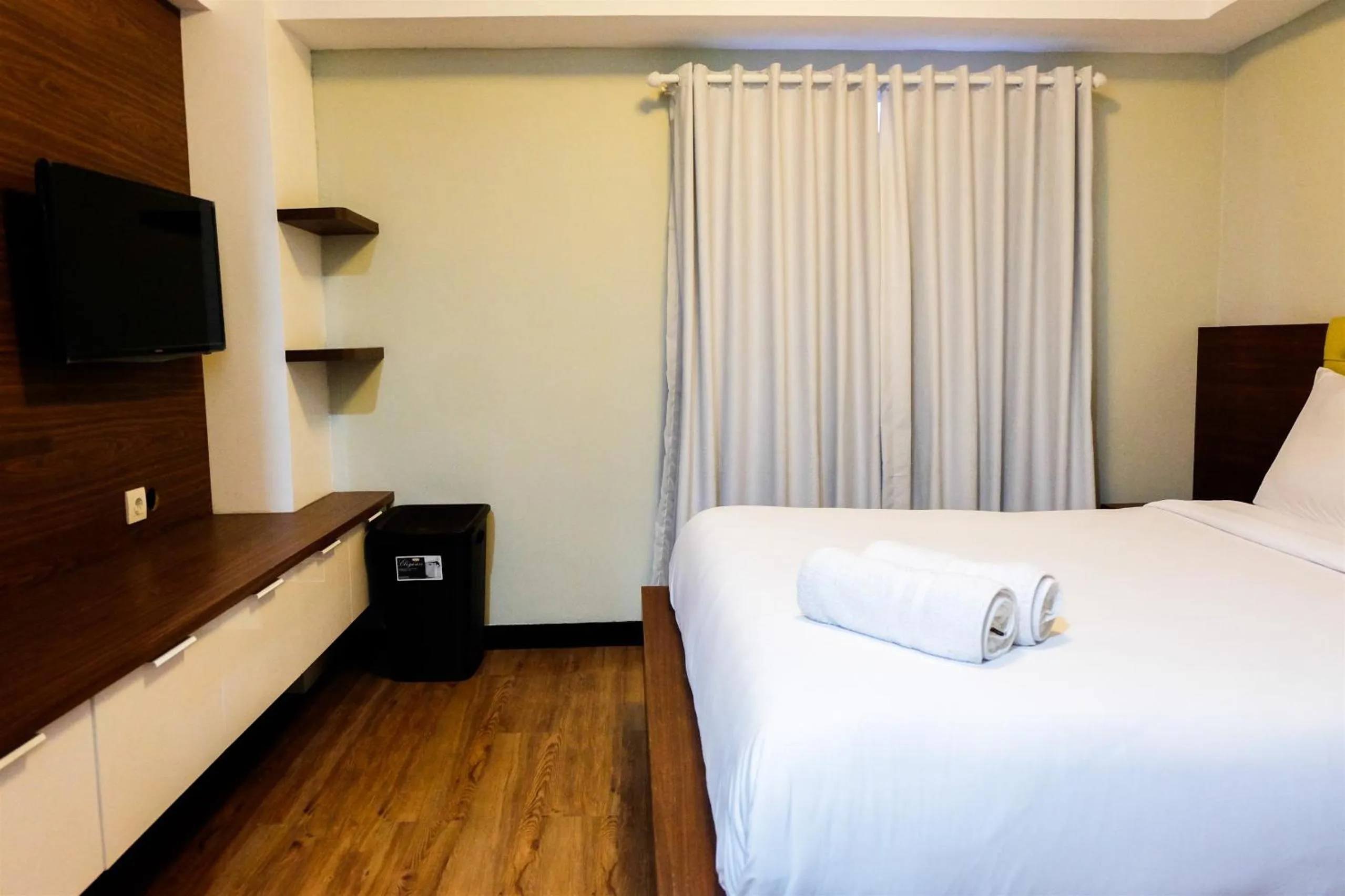 Bed in Amazing 2BR with City View The Wave Kuningan Apartment By Travelio