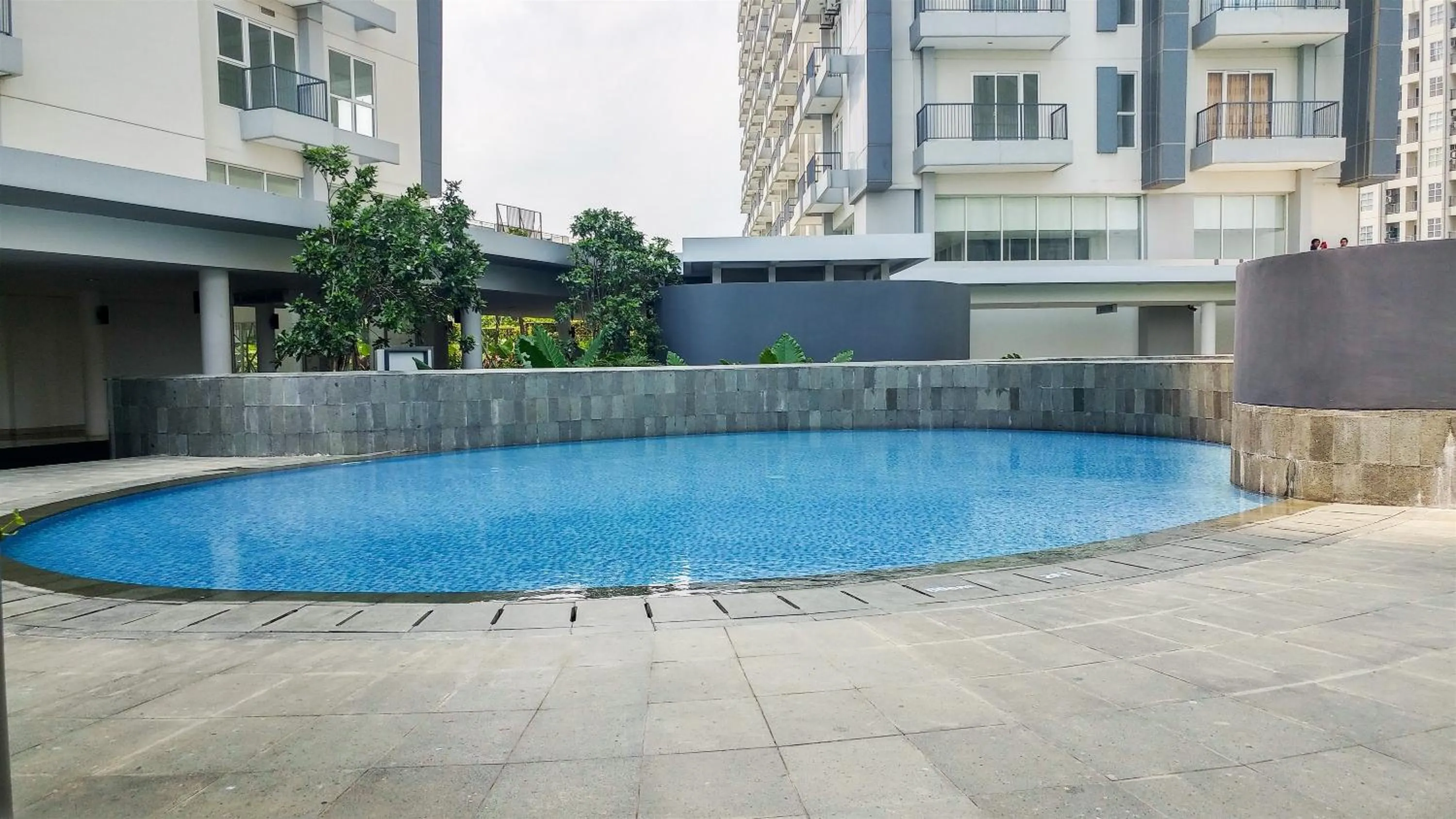 Exclusive 1BR Casa De Parco Apartment near AEON Mall By Travelio