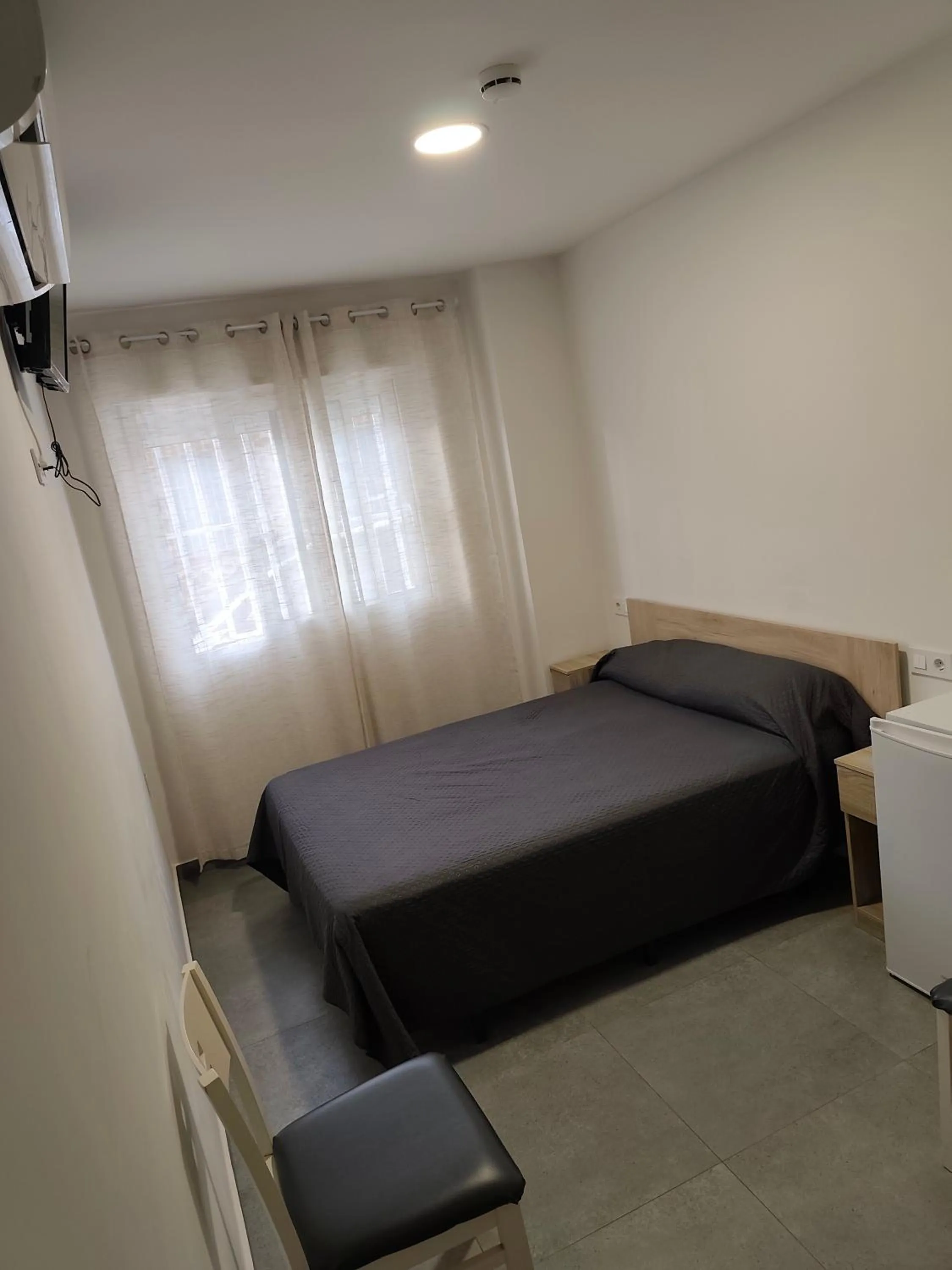 Bed in Pension La Puntica