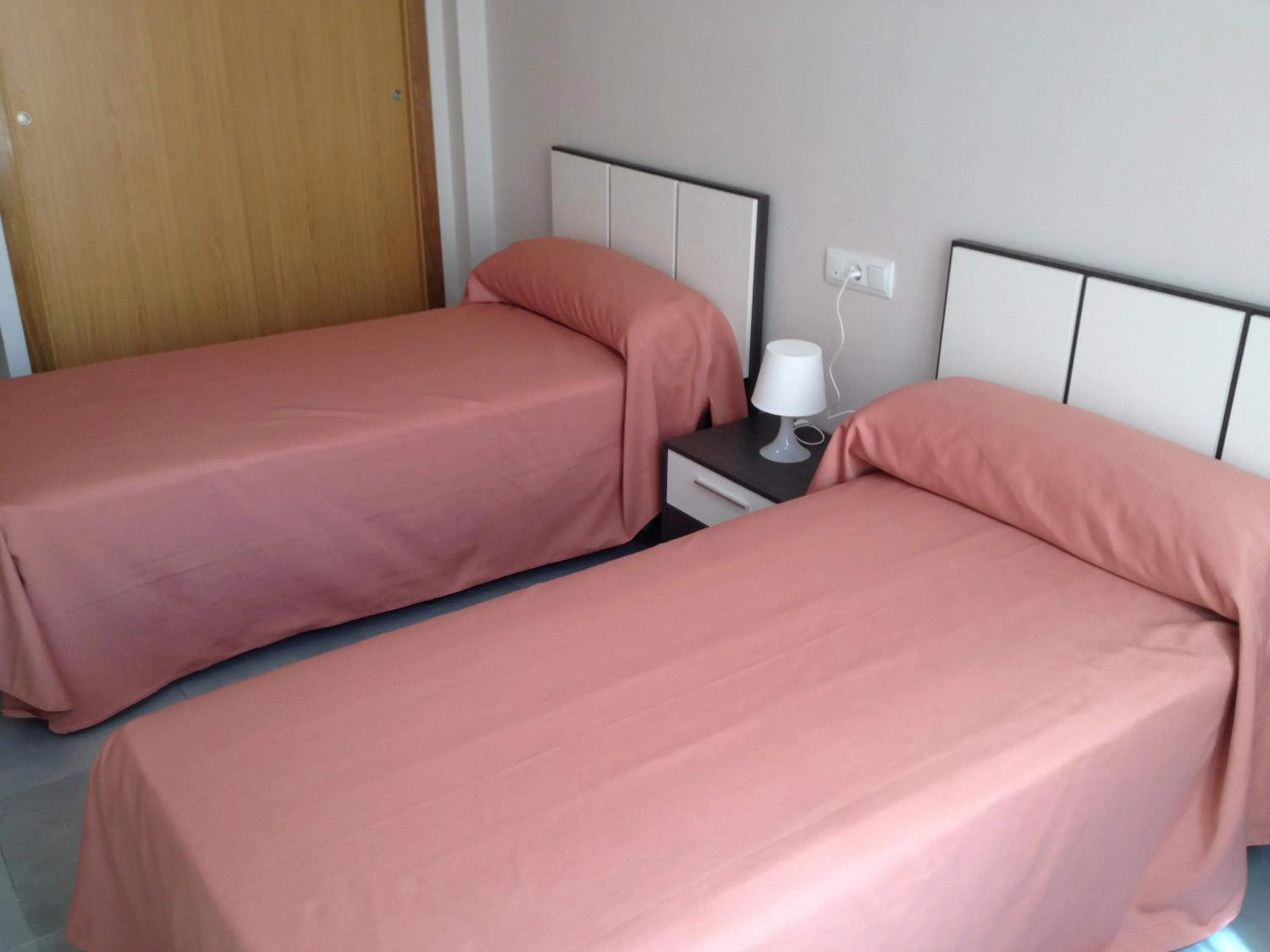 Bed in Pension La Puntica