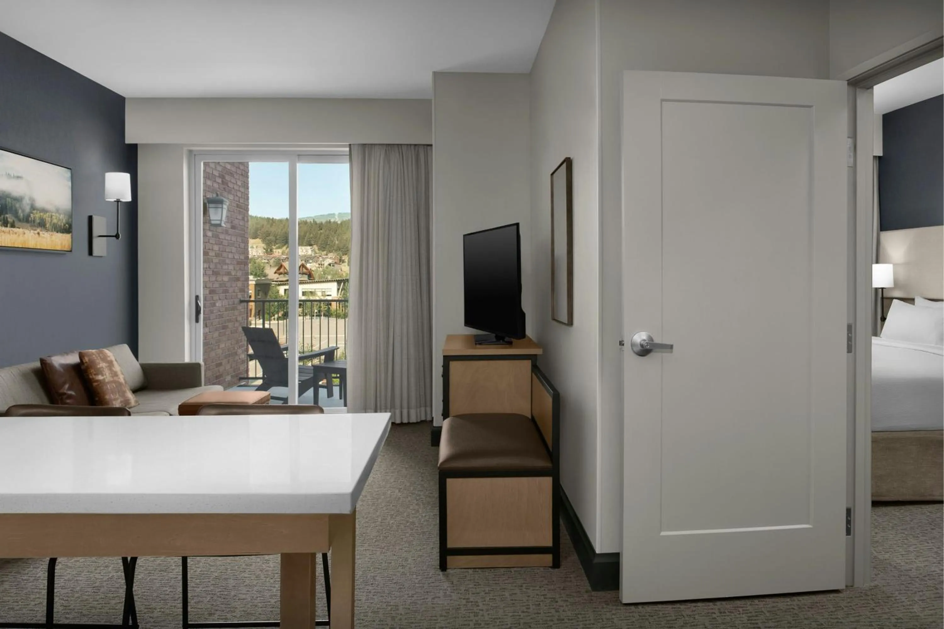 Living room, Bed in Residence Inn by Marriott Big Sky/The Wilson Hotel