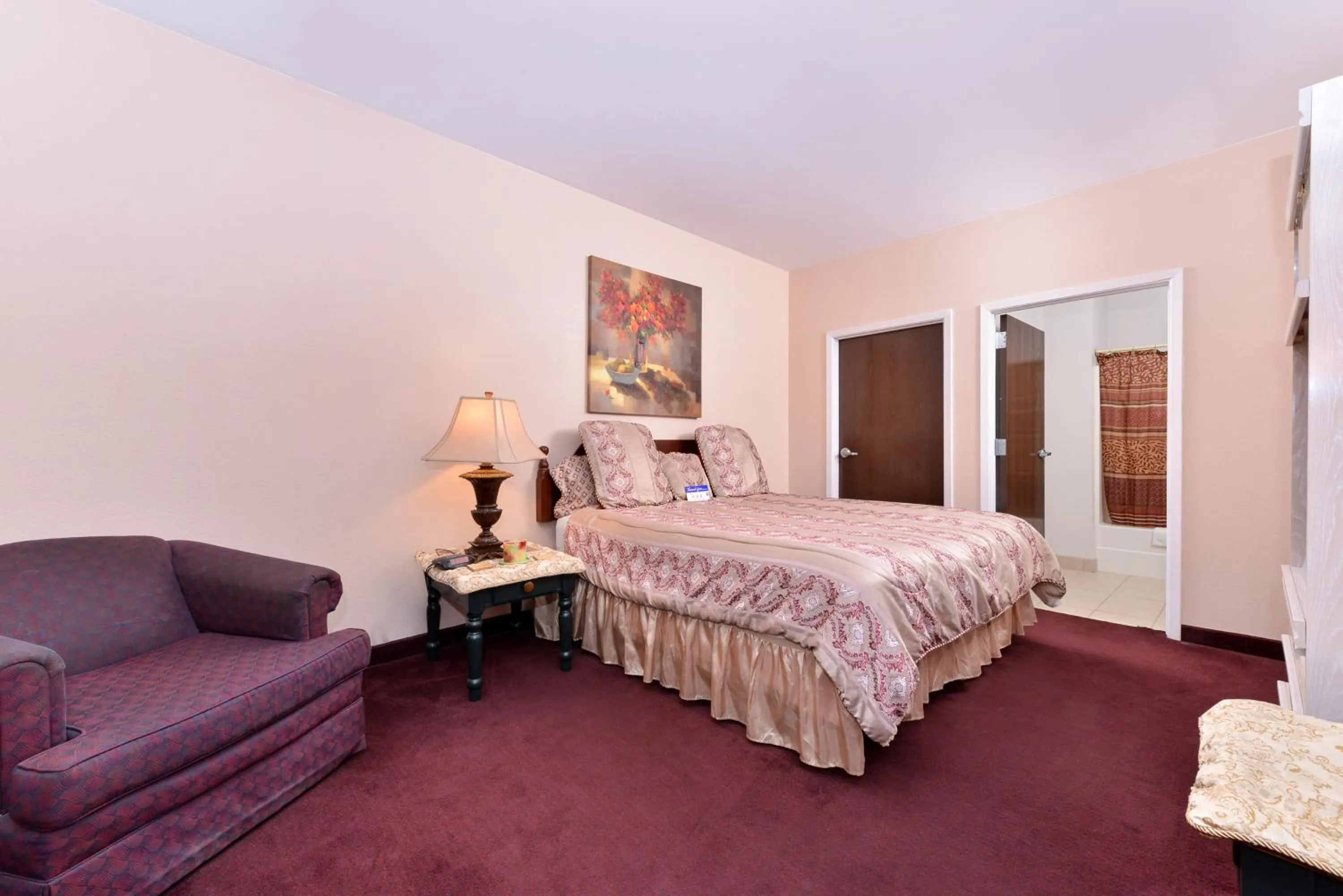 Photo of the whole room, Bed in Americas Best Value Inn Somerville Texas