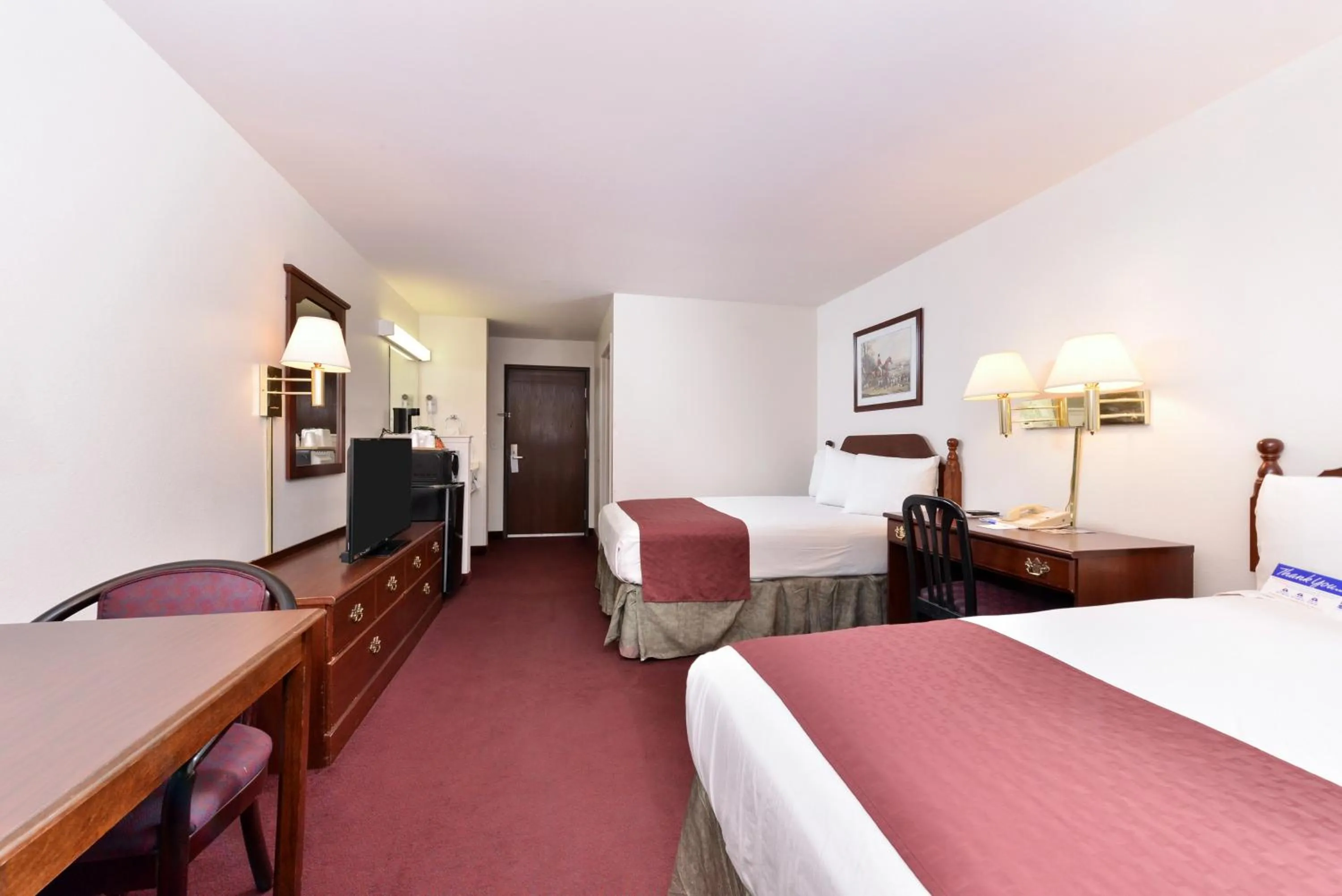 Photo of the whole room, Bed in Americas Best Value Inn Somerville Texas