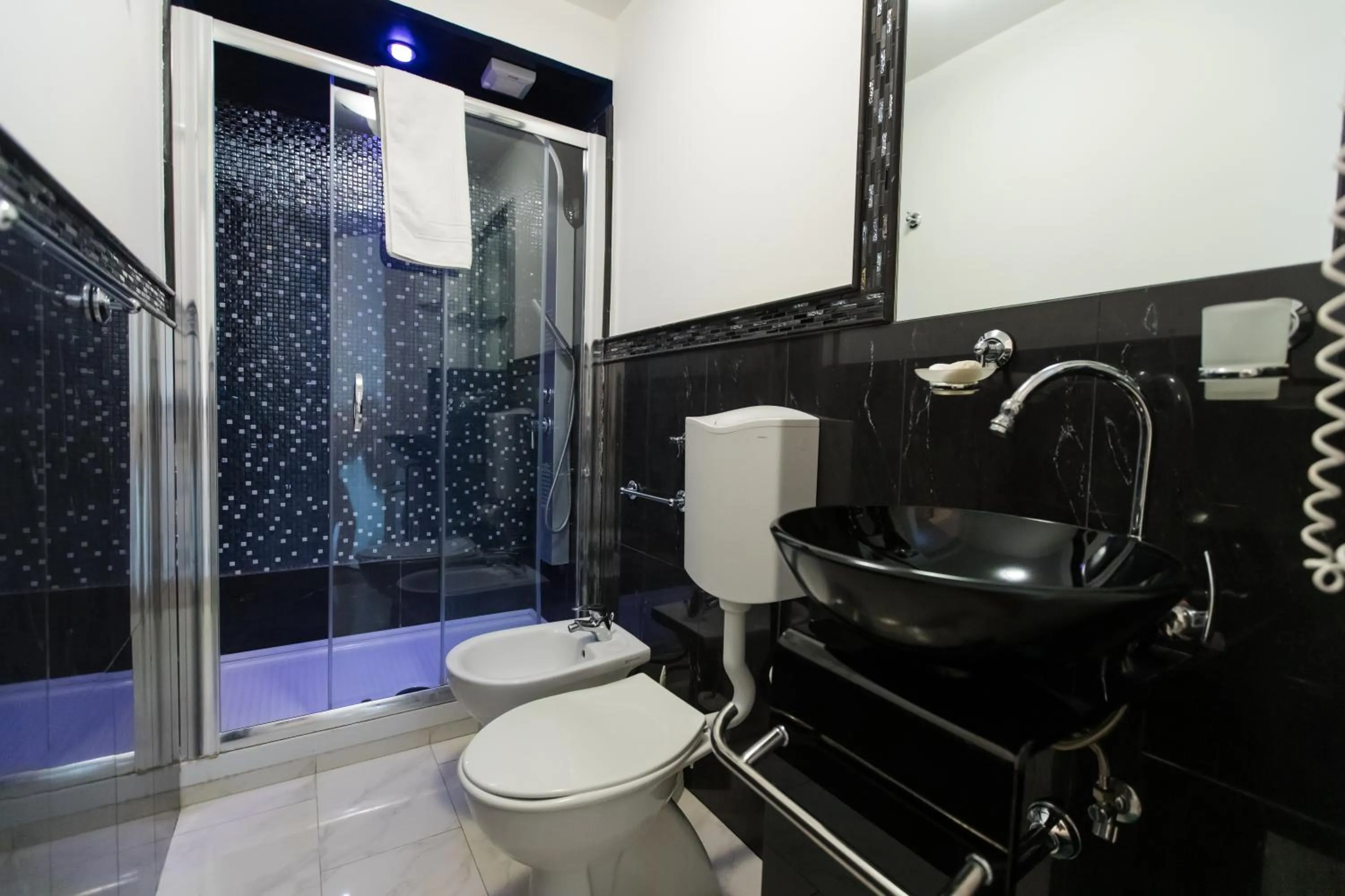 Shower in CapoSperone Resort