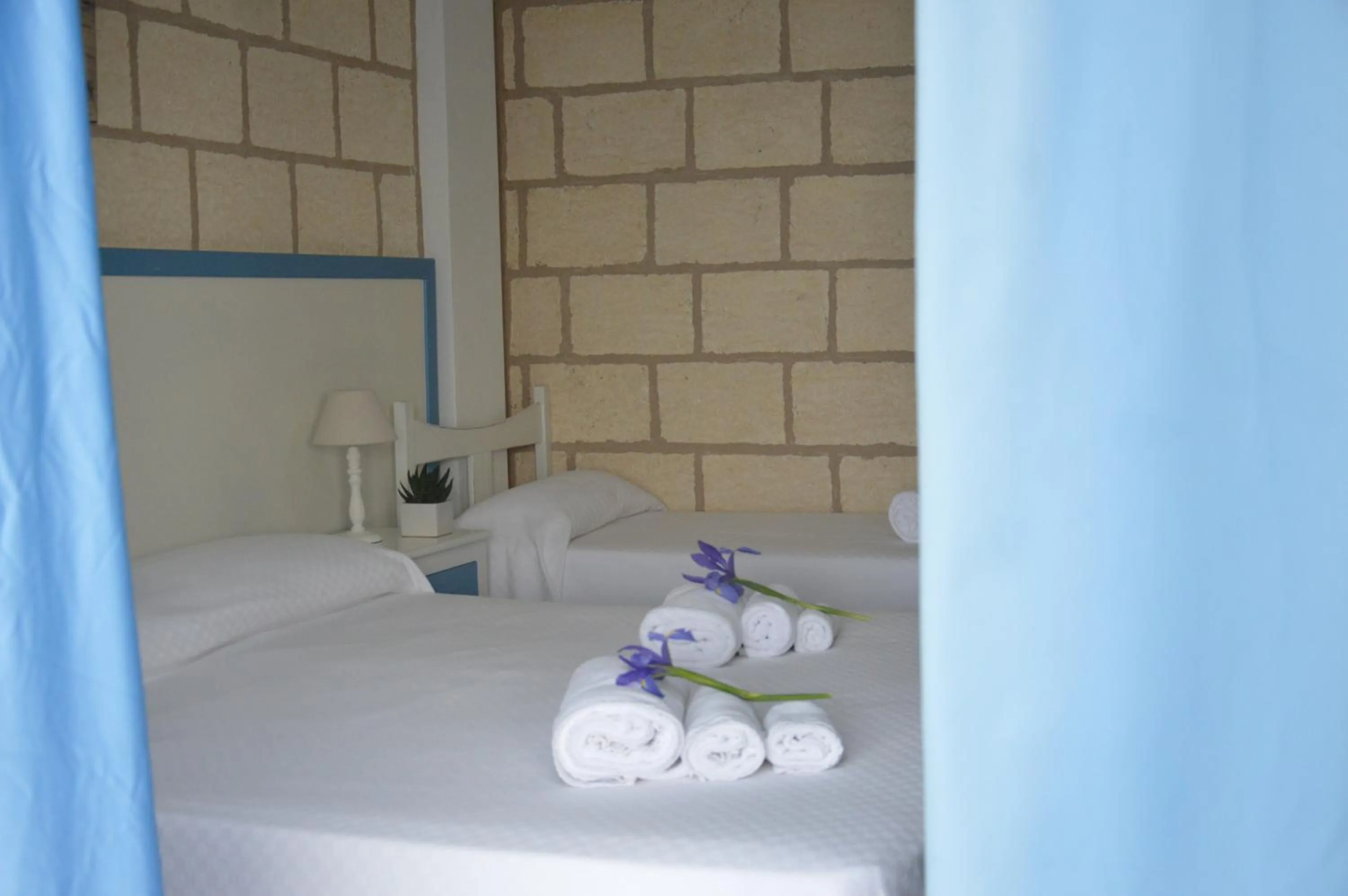 Bed in CapoSperone Resort