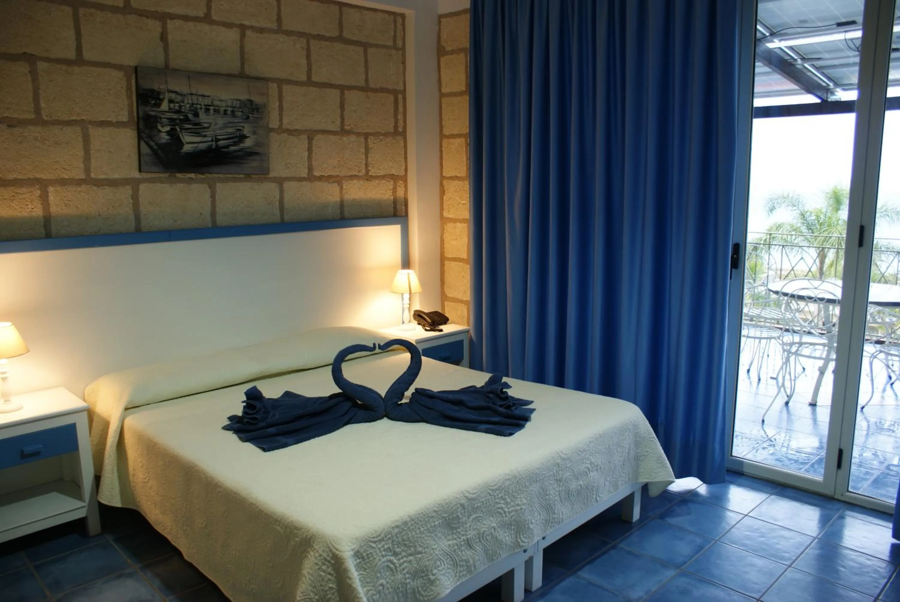 Bed in CapoSperone Resort