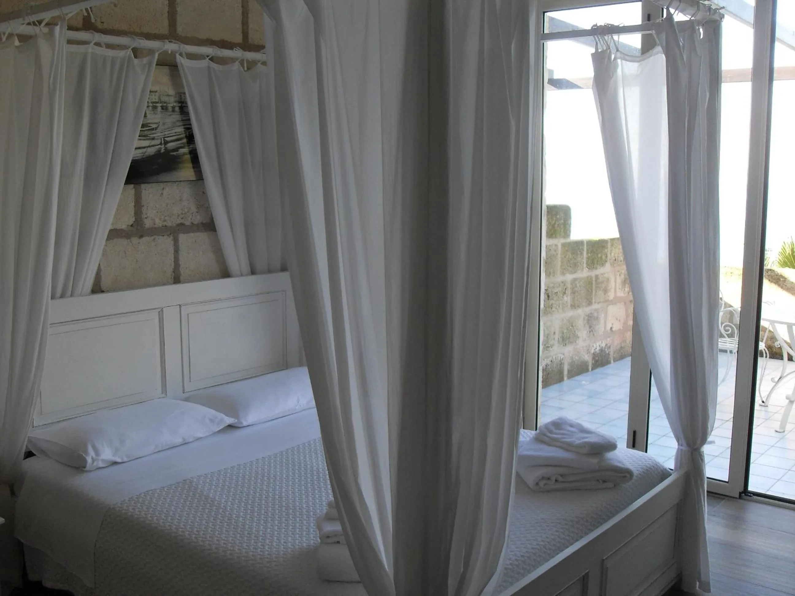 Bed in CapoSperone Resort