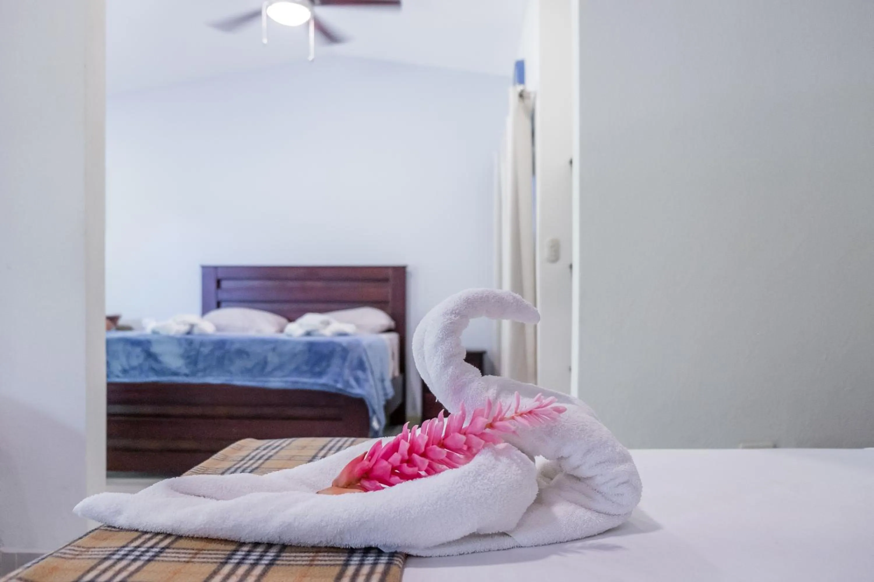 Bed in Zula Inn Aparthotel