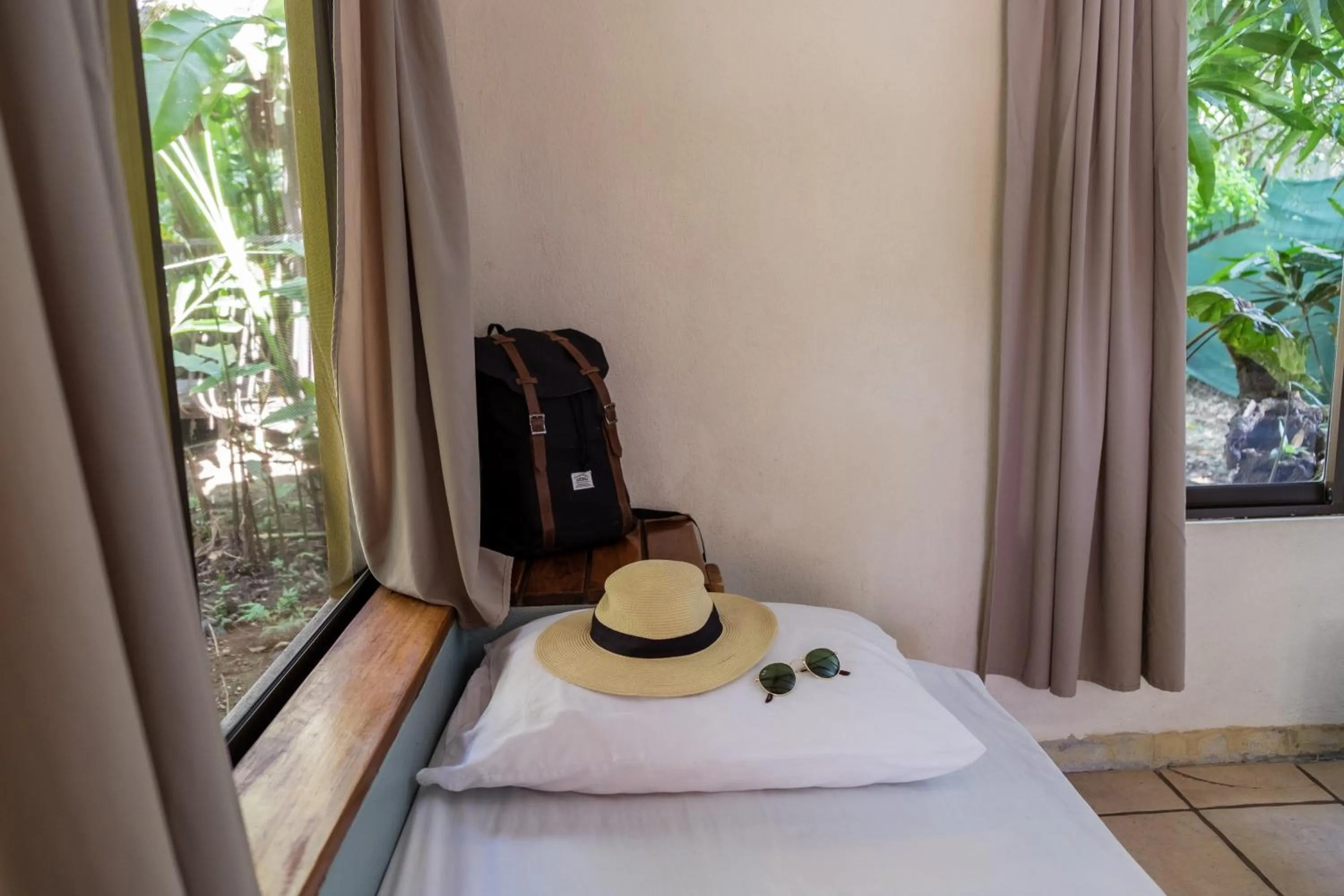 Bed in Zula Inn Aparthotel