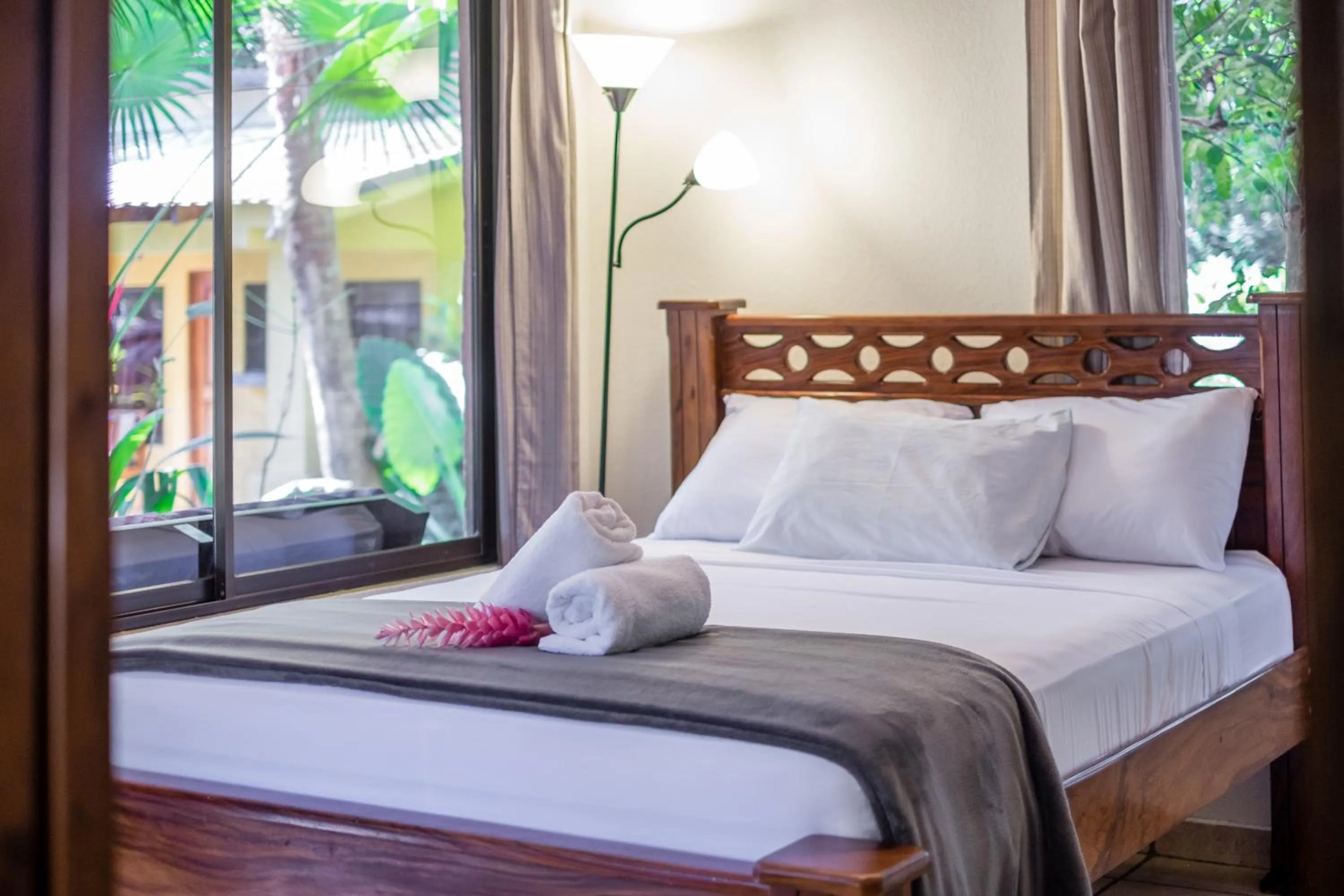 Bed in Zula Inn Aparthotel