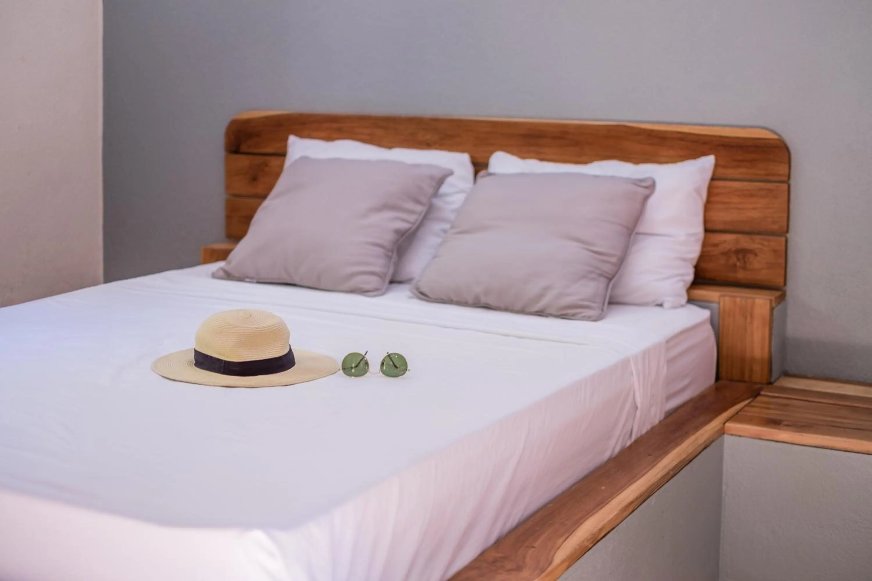 Bed in Zula Inn Aparthotel