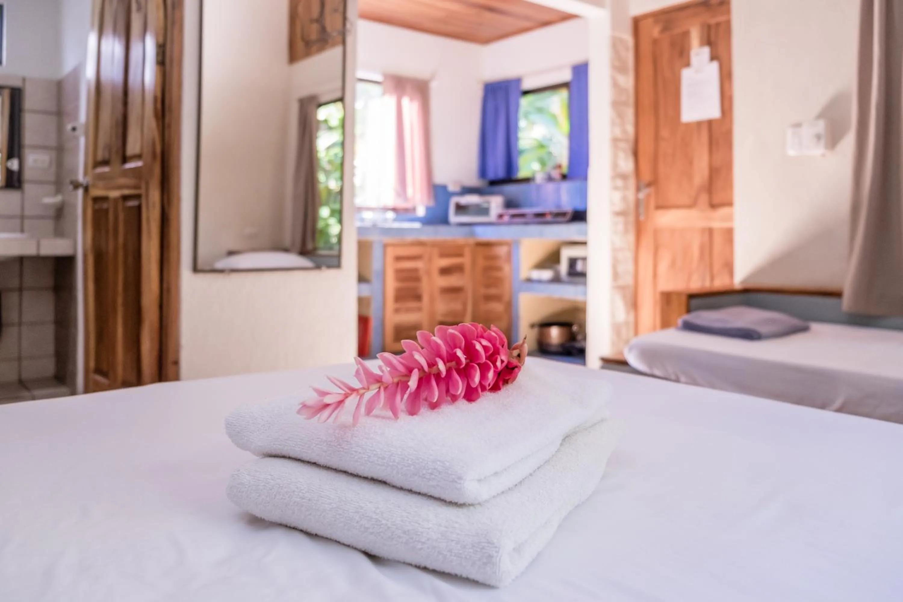 Bed in Zula Inn Aparthotel