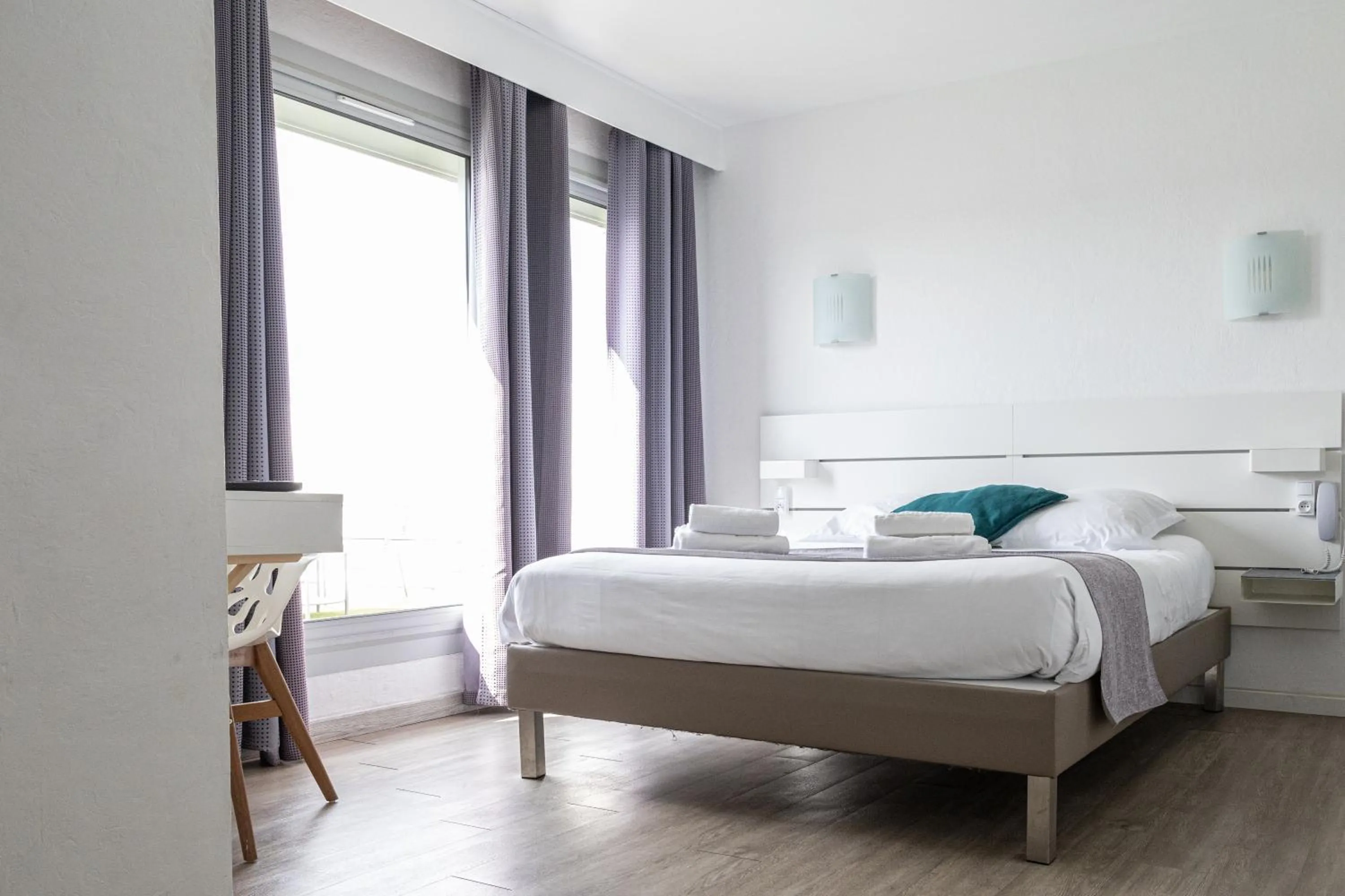 Bed in Hotel Aquarius