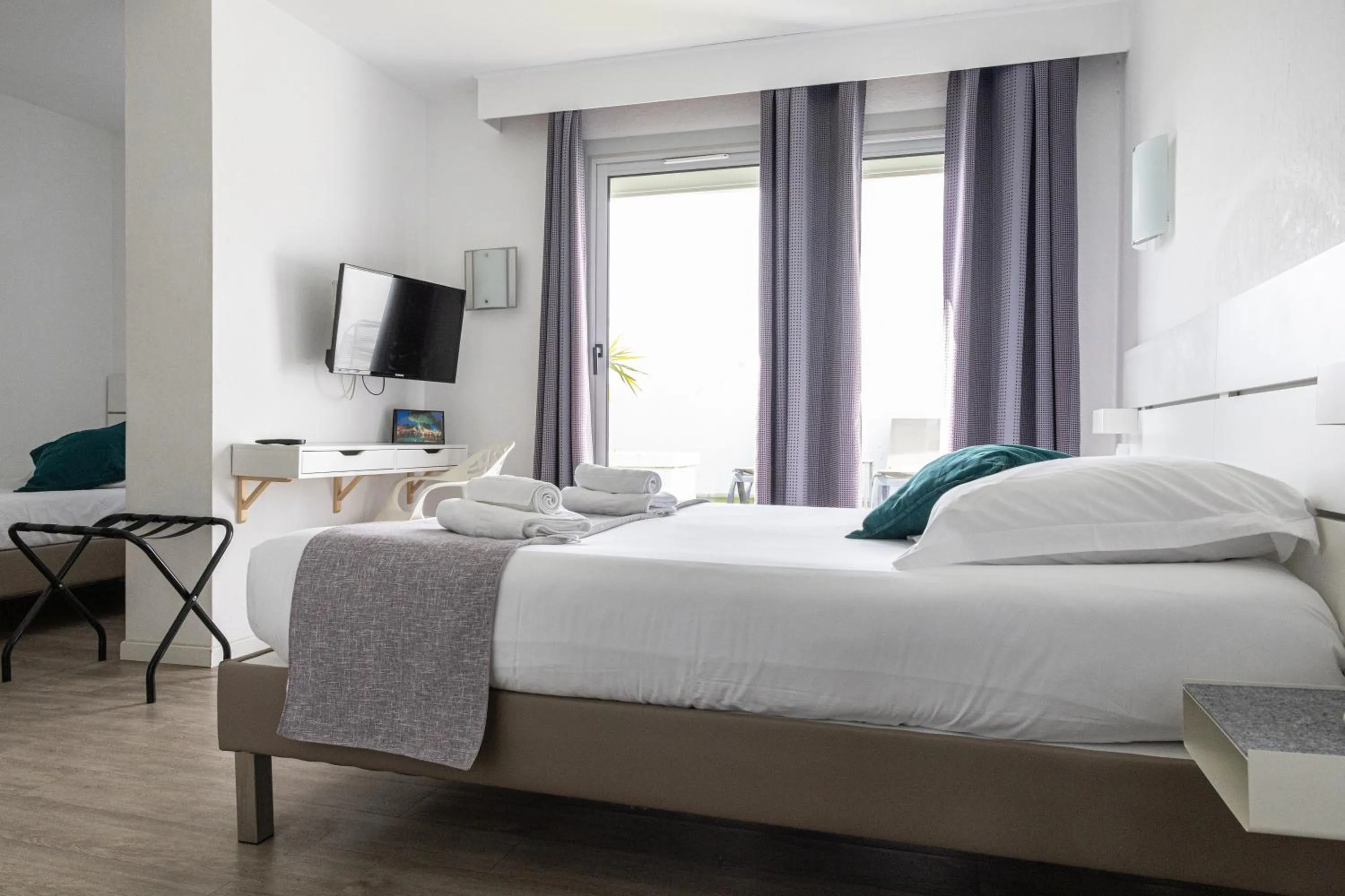 Bed in Hotel Aquarius