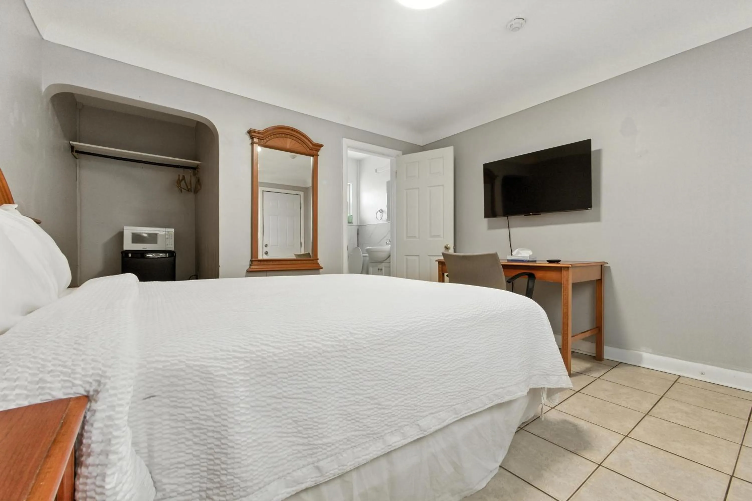 Bed in iCheck Inn Motel