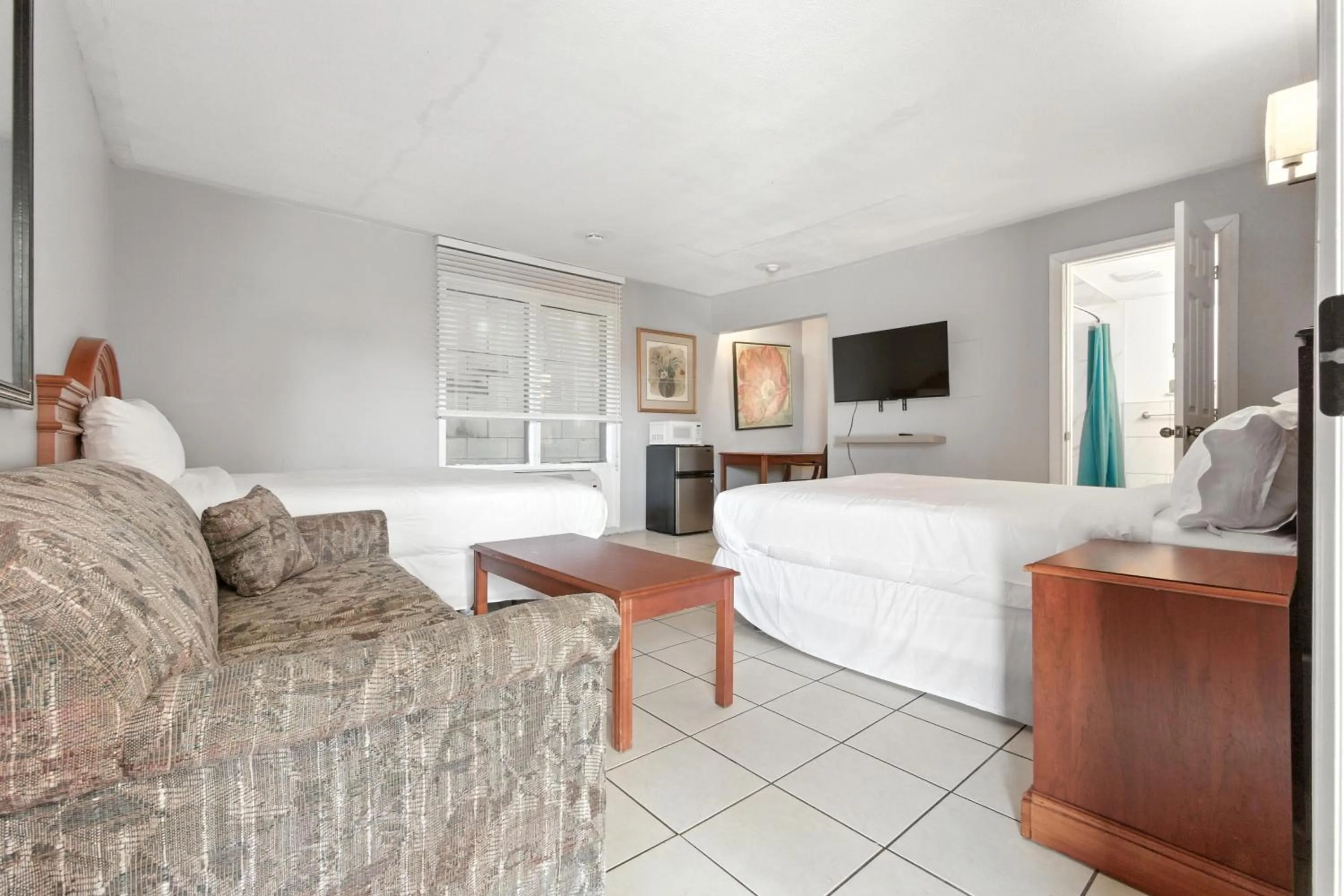 Bed in iCheck Inn Motel