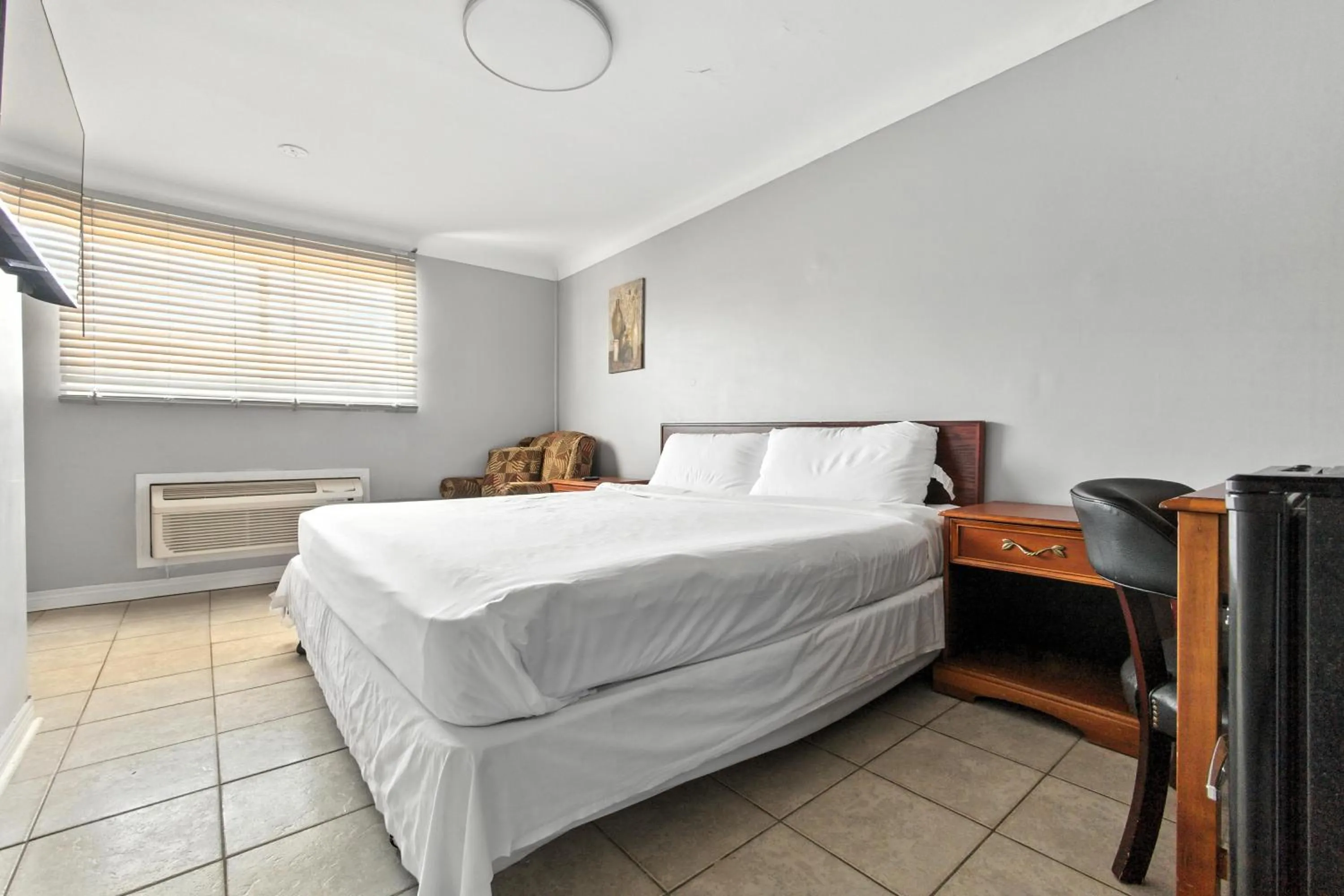 Bed in iCheck Inn Motel