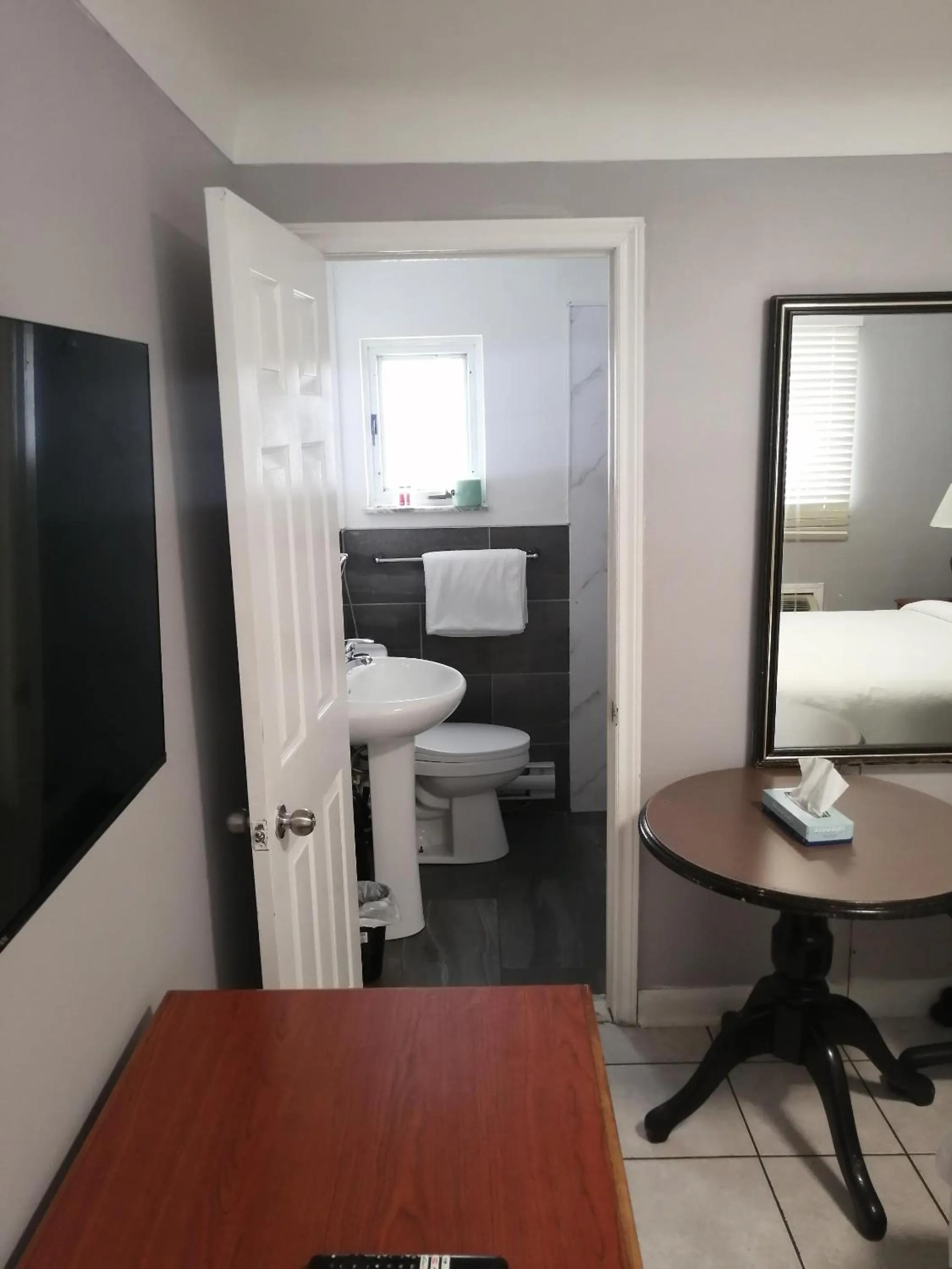 Toilet in iCheck Inn Motel