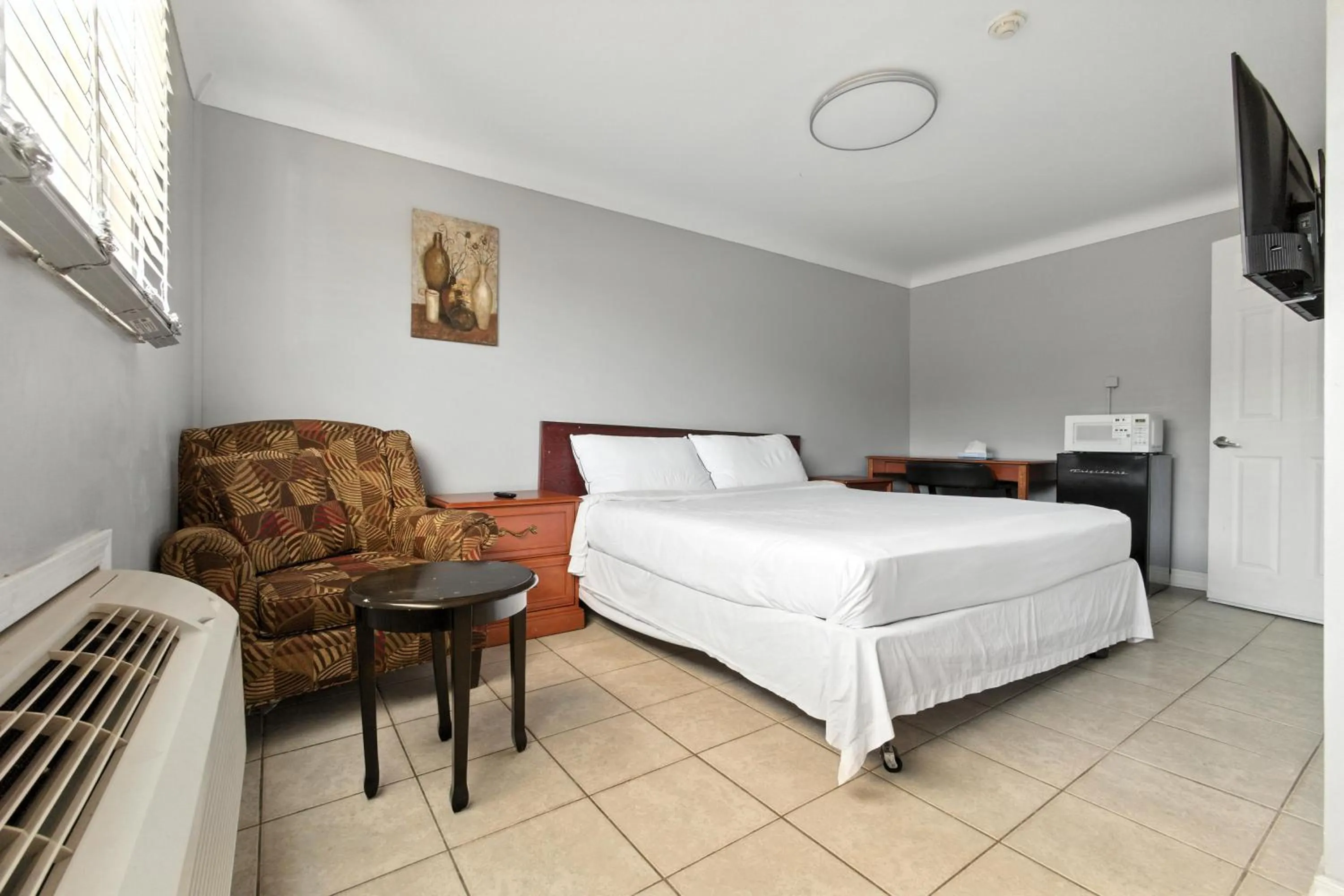 Bed in iCheck Inn Motel