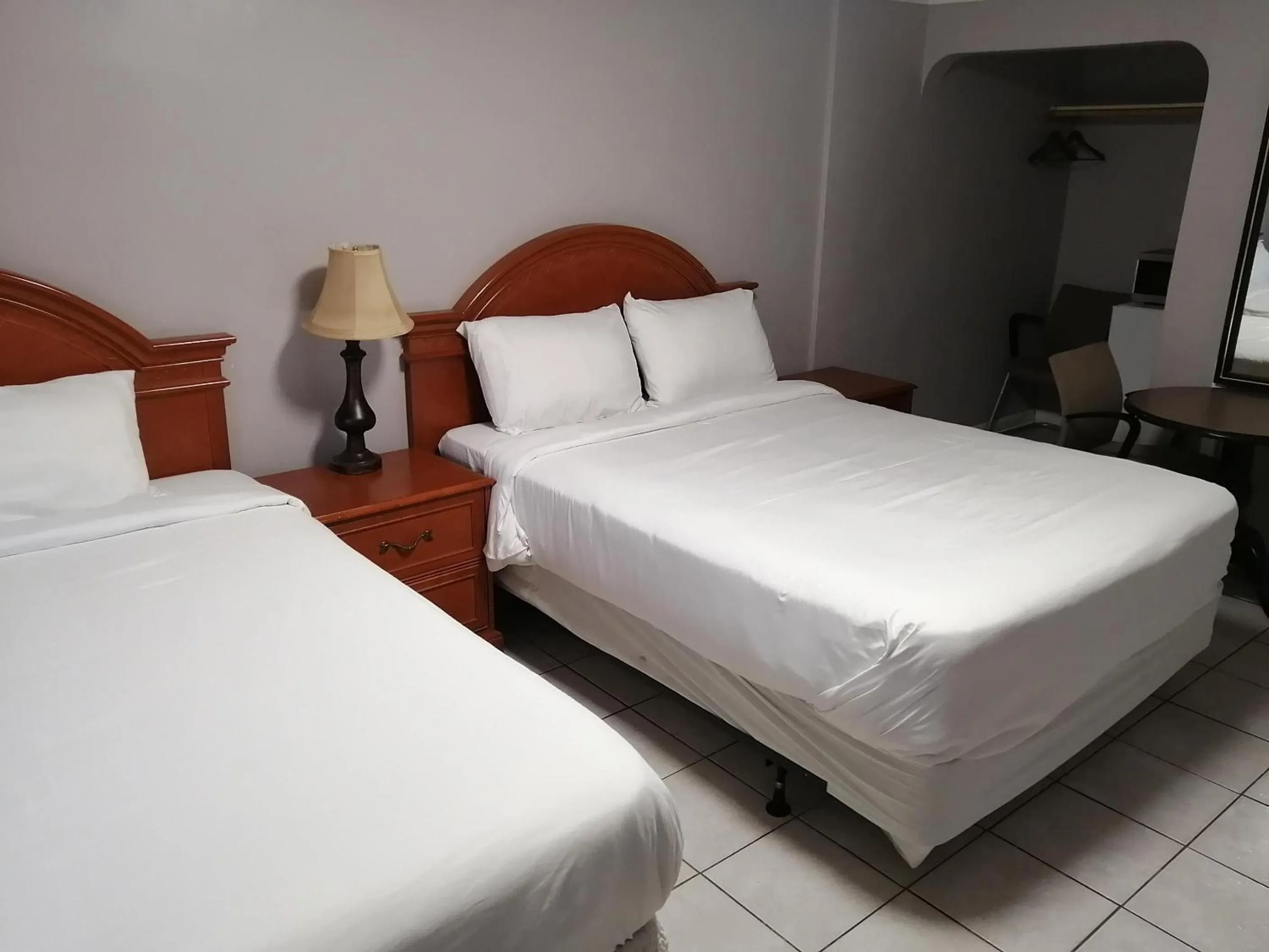 Bed in iCheck Inn Motel