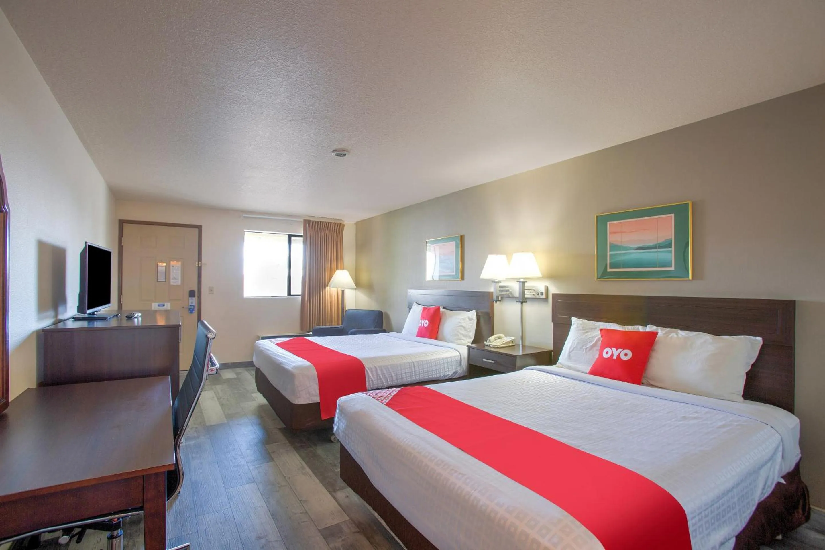 Bedroom, Bed in OYO Woodland Hotel and Suites