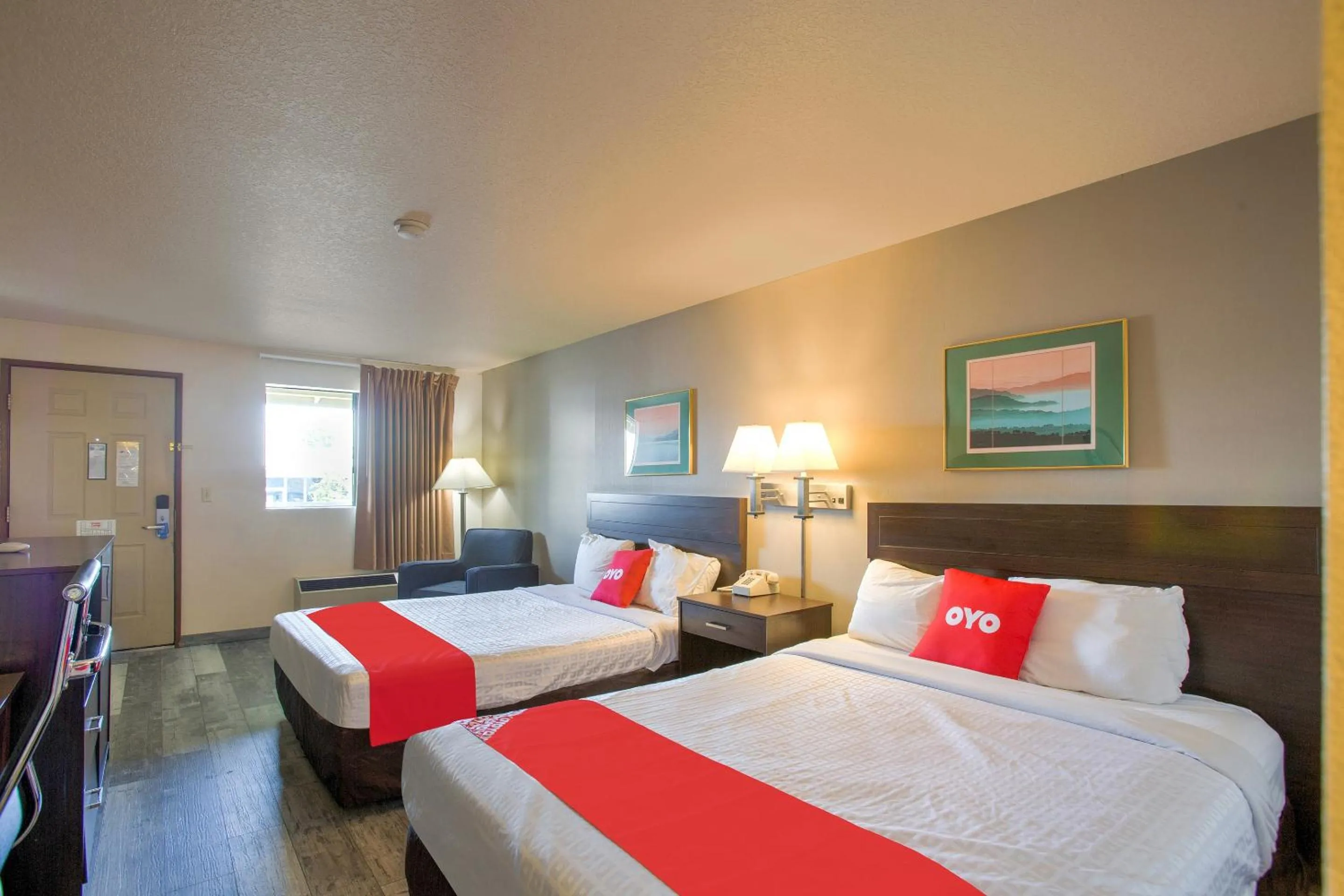 Bedroom, Bed in OYO Woodland Hotel and Suites