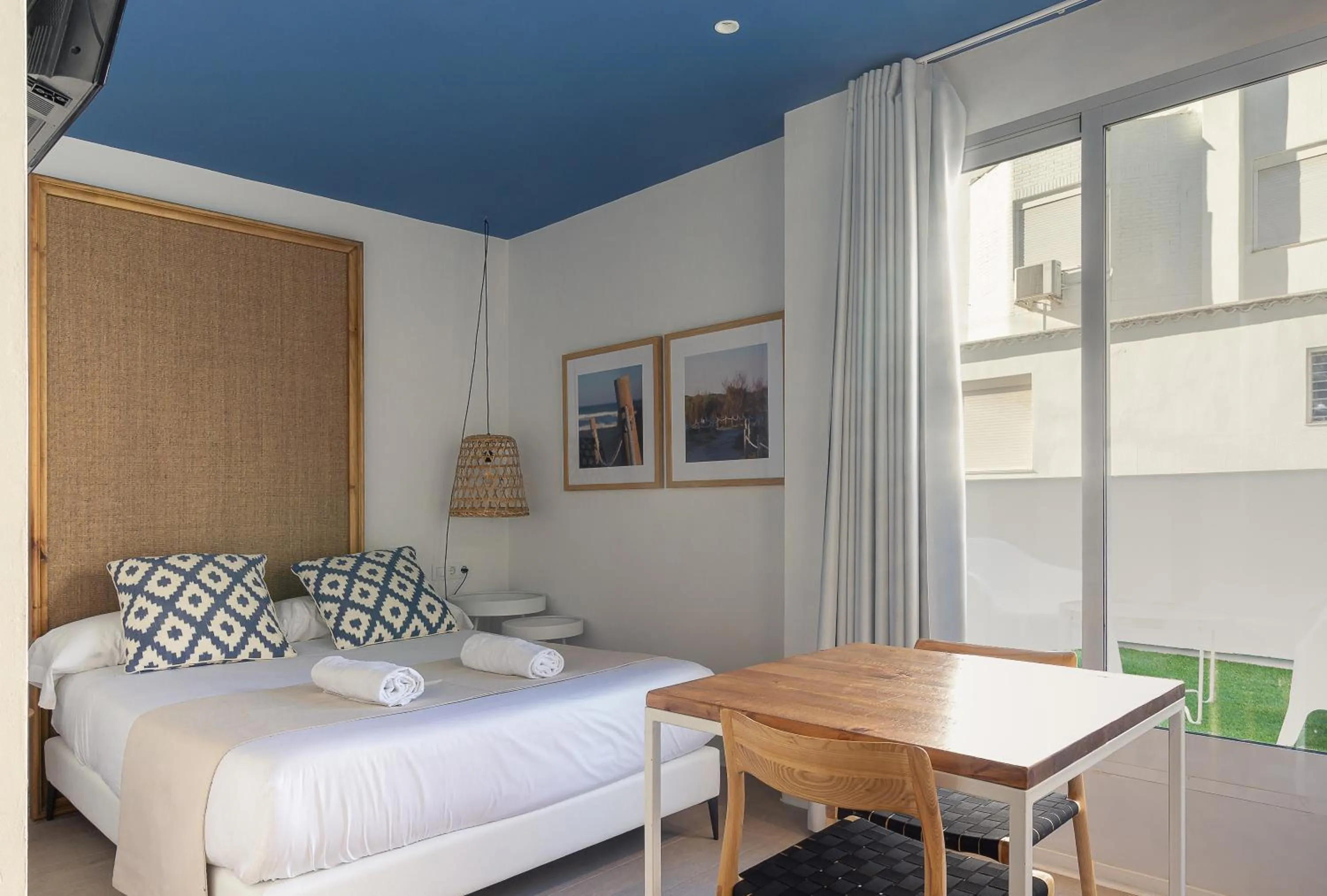 Photo of the whole room, Bed in YOU & CO. Saler Beach Boutique