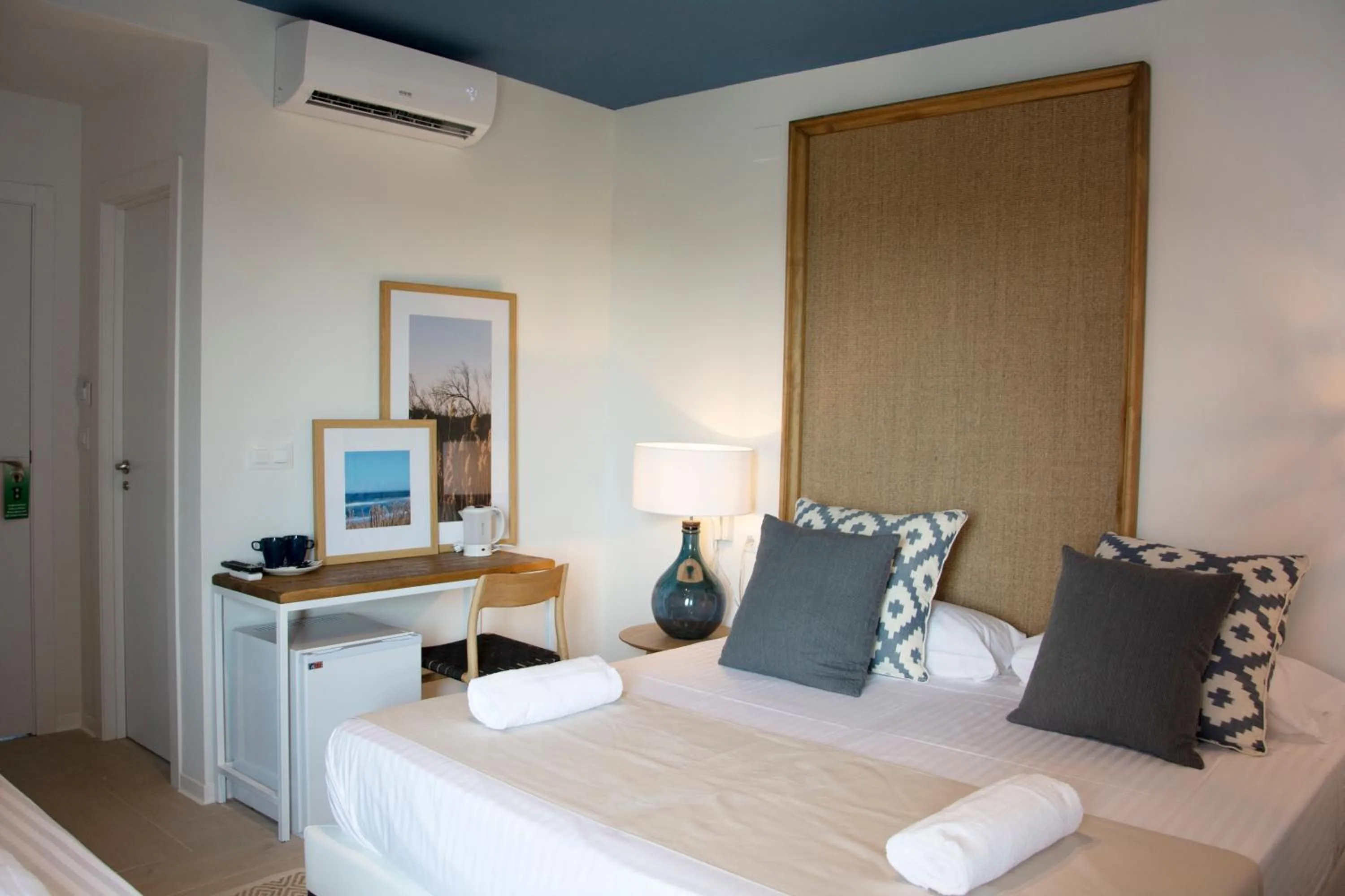 Photo of the whole room, Bed in YOU & CO. Saler Beach Boutique