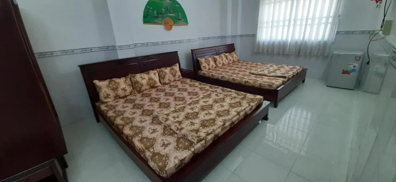 Bed in Huynh Lac Can Tho Hotel
