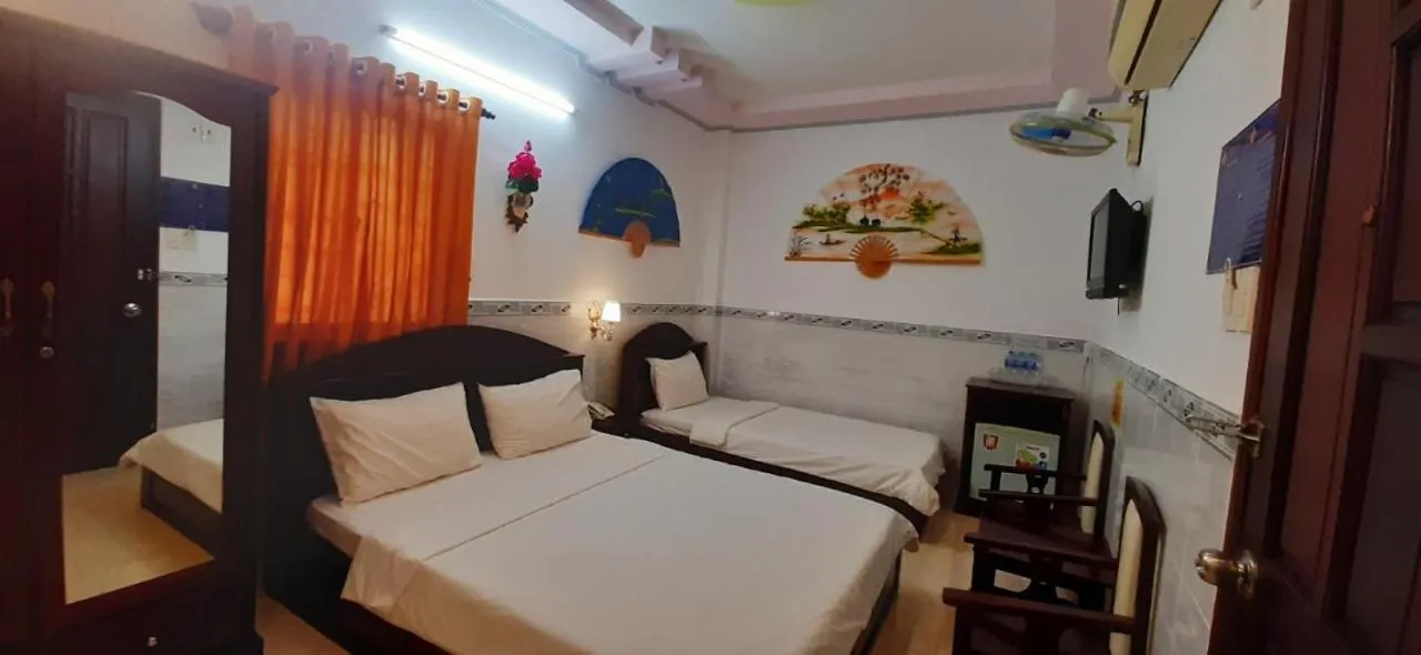 Bed in Huynh Lac Can Tho Hotel