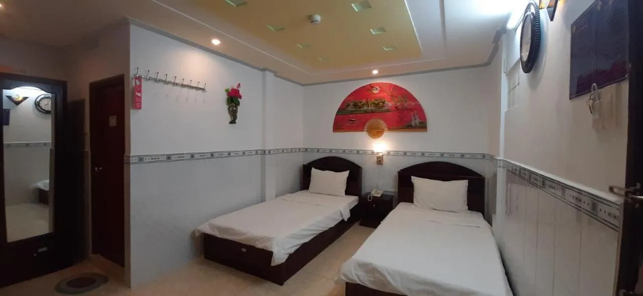 Bed in Huynh Lac Can Tho Hotel