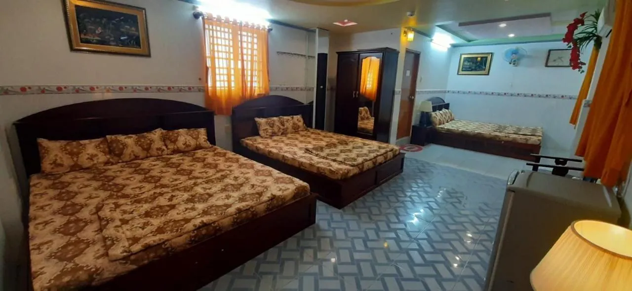 Bed in Huynh Lac Can Tho Hotel