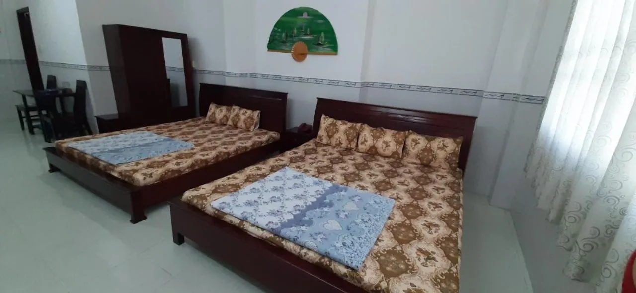 Bed in Huynh Lac Can Tho Hotel